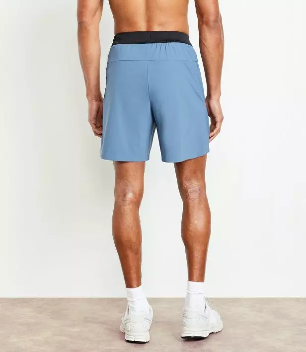 Image of male model wearing Old Navy ProTrain lined shorts.