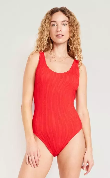 A female model wears a Ribbed One-Piece Swimsuit.