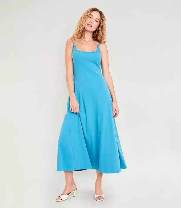 Image of a model wearing fit and flare maxi dress.