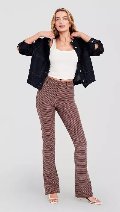 Female model wearing high waisted pixie flare pants.