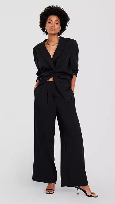 A high-waisted crinkle gauze wide leg pants and matching button down shirt.
