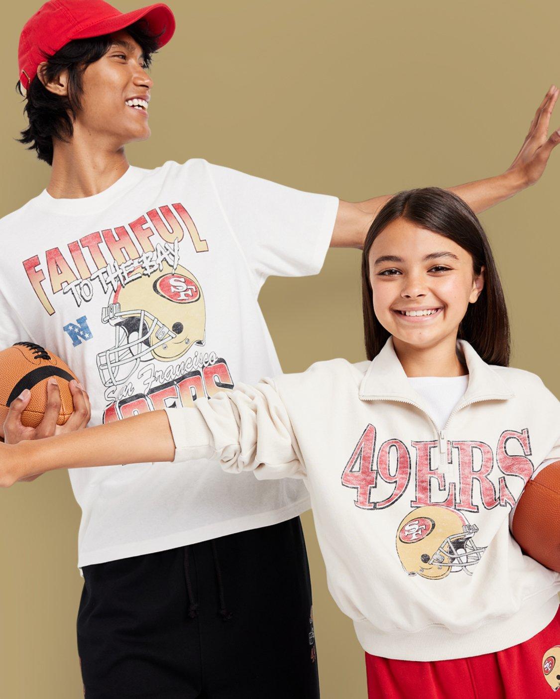 Image of fans wearing Old Navy NFL merchandise.