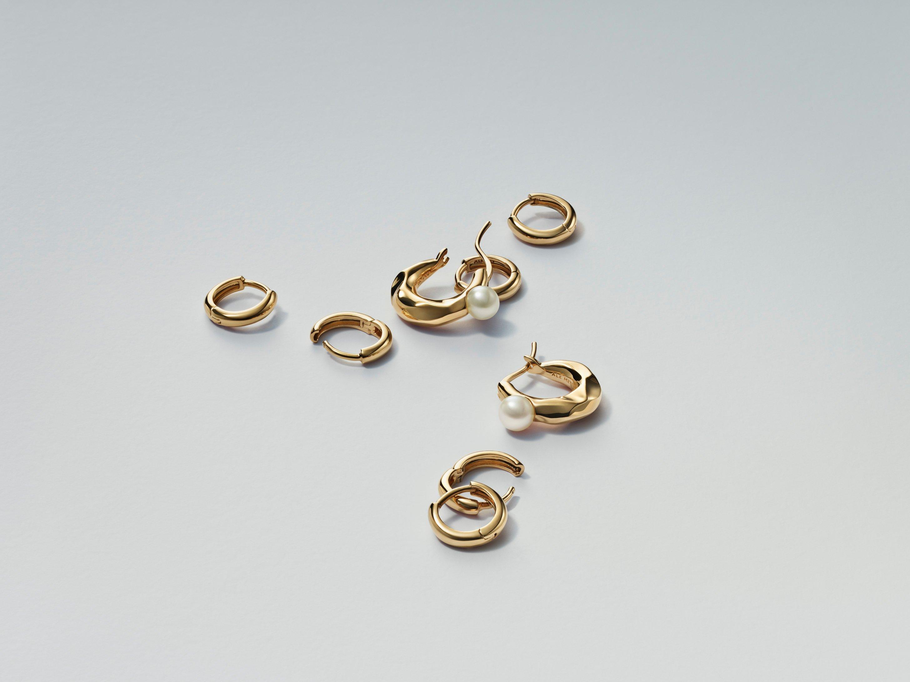 PANDORA ESSENCE met goud vergulde oorringen met parels