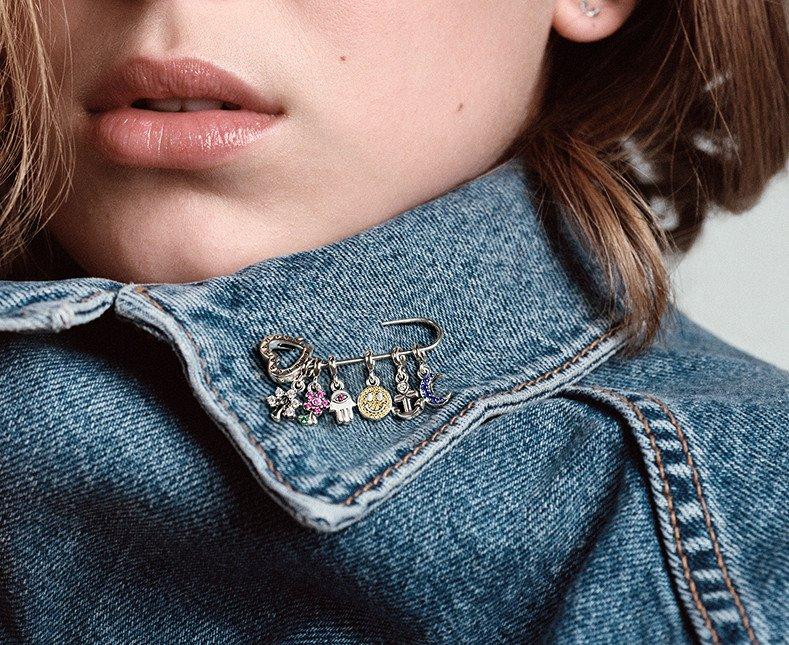 Pin your favourite charms anywhere with the Pandora Me brooch.