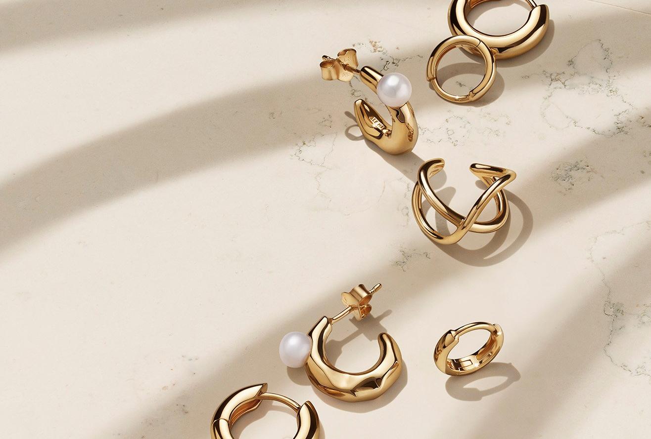 Pandora essence gold and pearls hoops earrings.