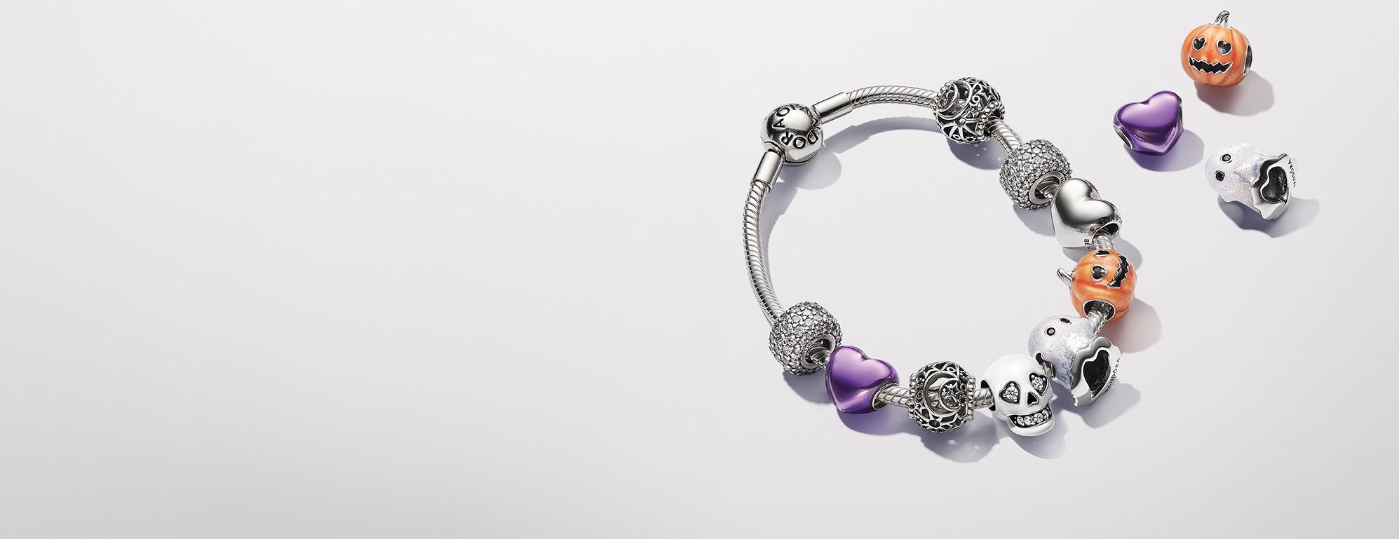 Pandora halloween charms, ghosts, pumpkins, purple hearts, bracelet.