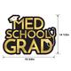 Metallic Med School Grad Cardstock Cutout, 19.75in x 16.5in