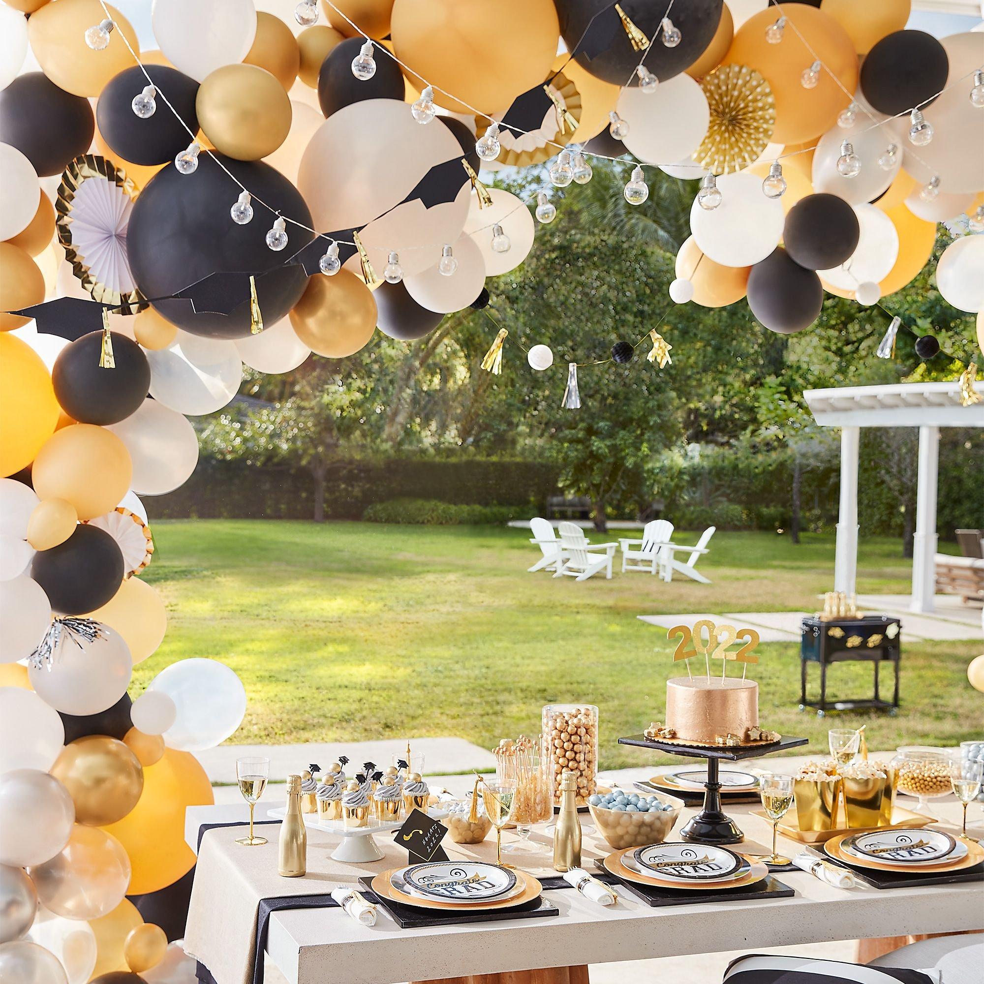 Black and Gold Table Decorations for 100th Birthday Party