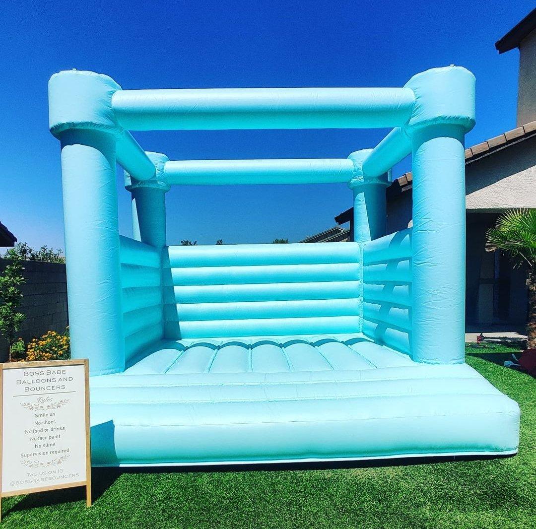 Turquoise Bounce House Boss Babe Bouncers Party City