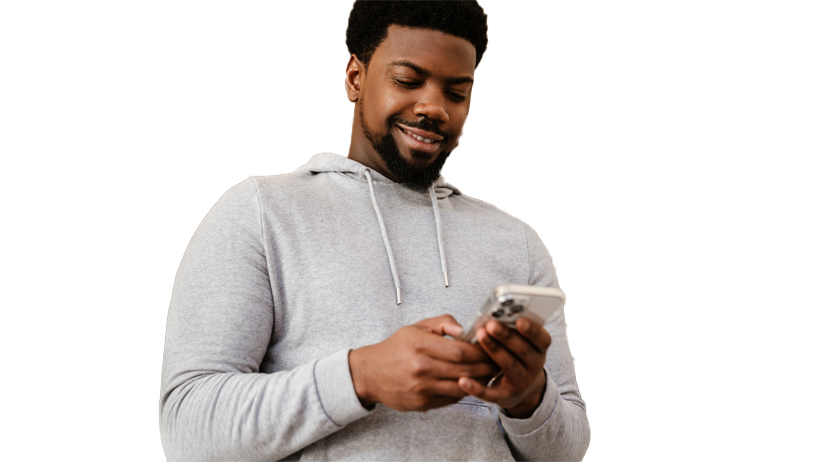 Smiling Man Wearing Hoodie on Mobile Phone