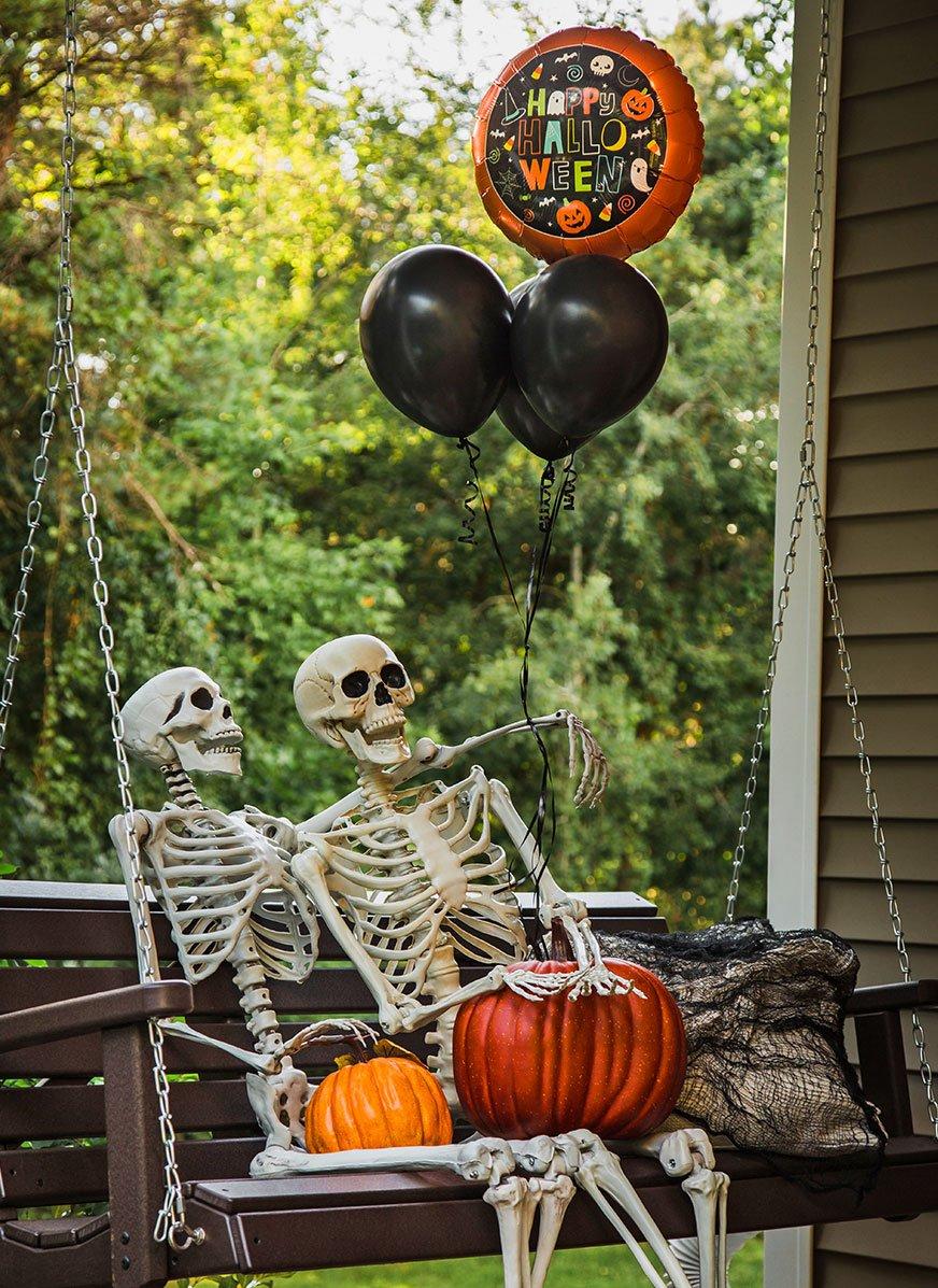 DIY Outdoor Halloween Decorations Skeletons on Swing