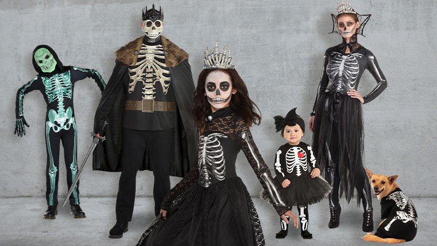 Family dressed in Skeleton costumes