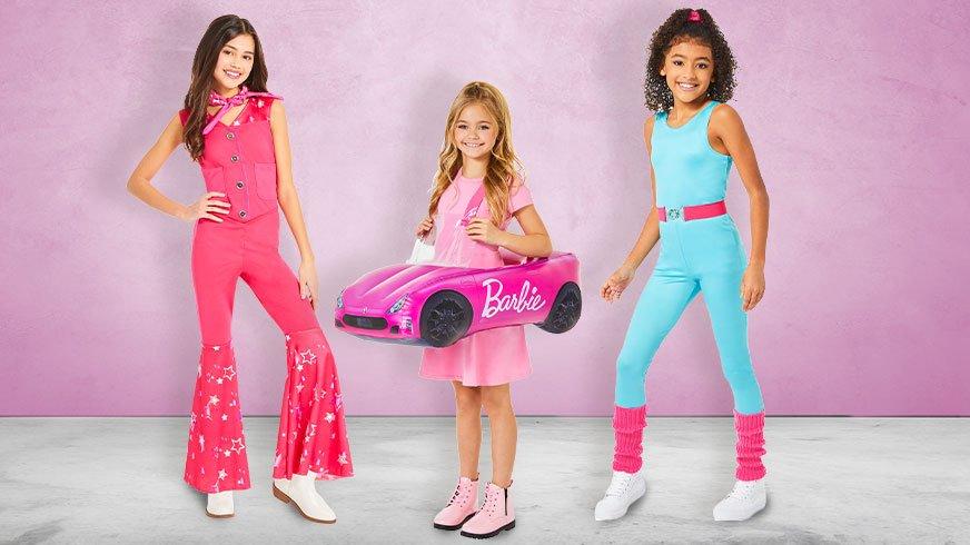 Girls dressed in Barbie costumes