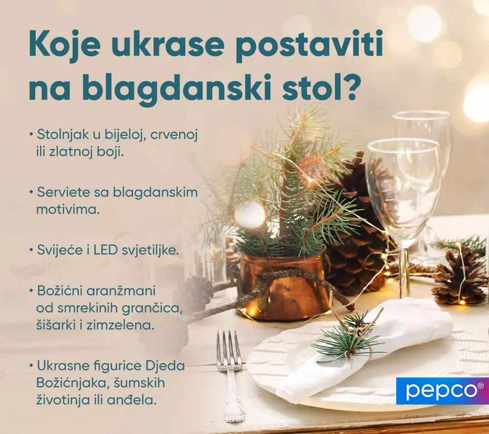 Praznično postavljen stol sa čašama, borovima šiškama, LED svjetlima i božićnim ukrasima.