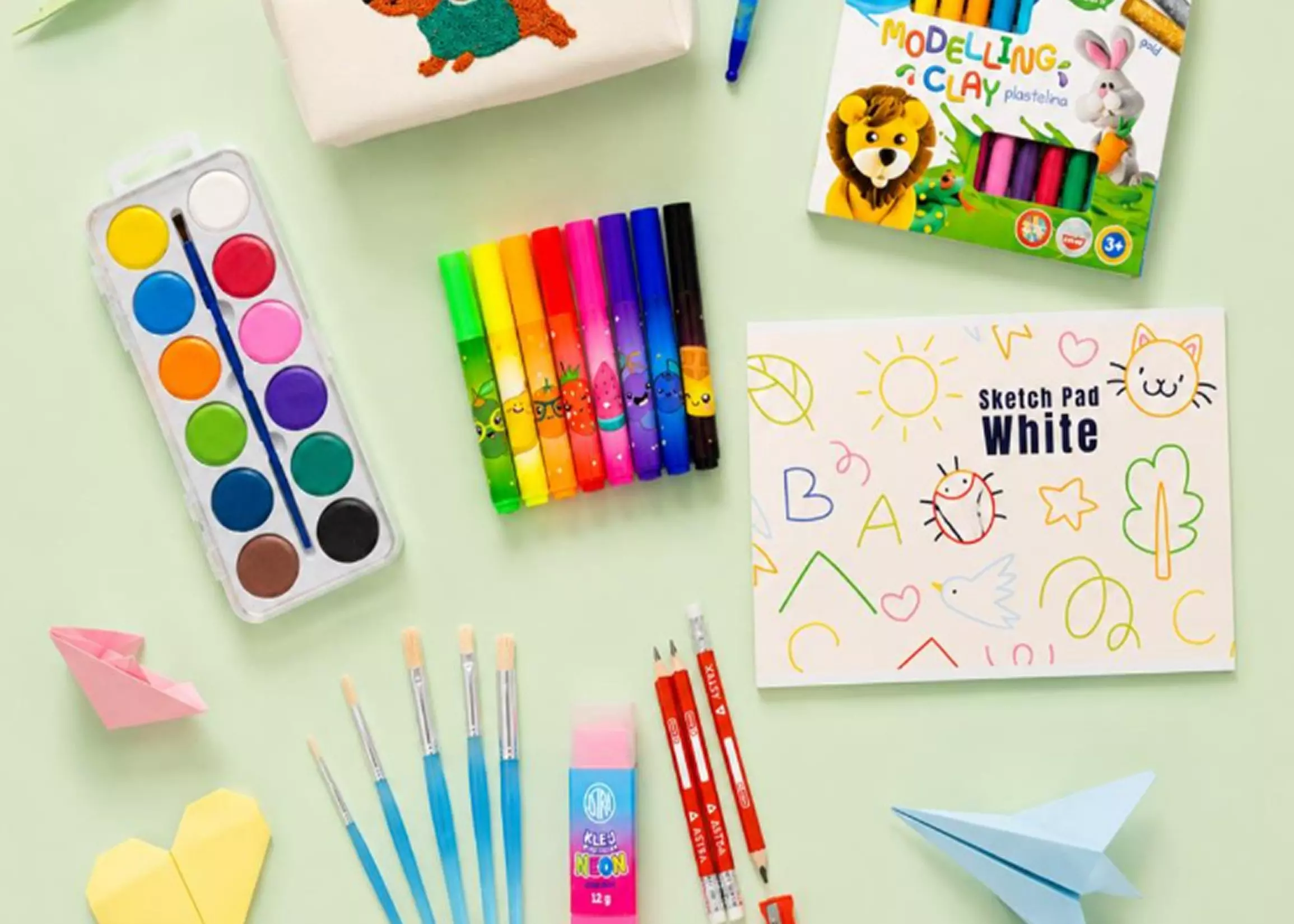 Set de materiale creative pentru copii Pepco cu acuarele, markere colorate, pensule și plastelină.