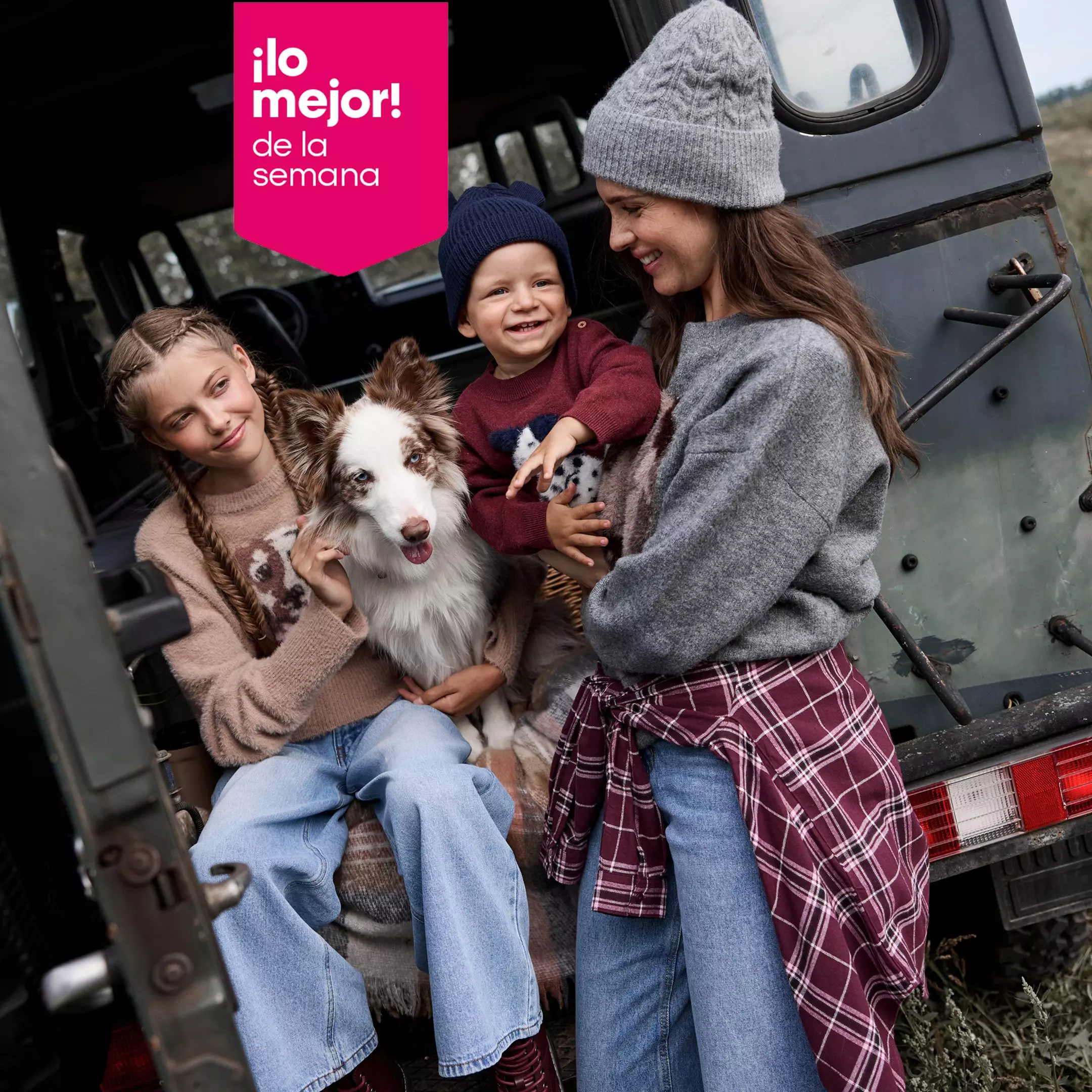 Familia Pepco disfrutando de un día al aire libre con su perro junto a un vehículo vintage.