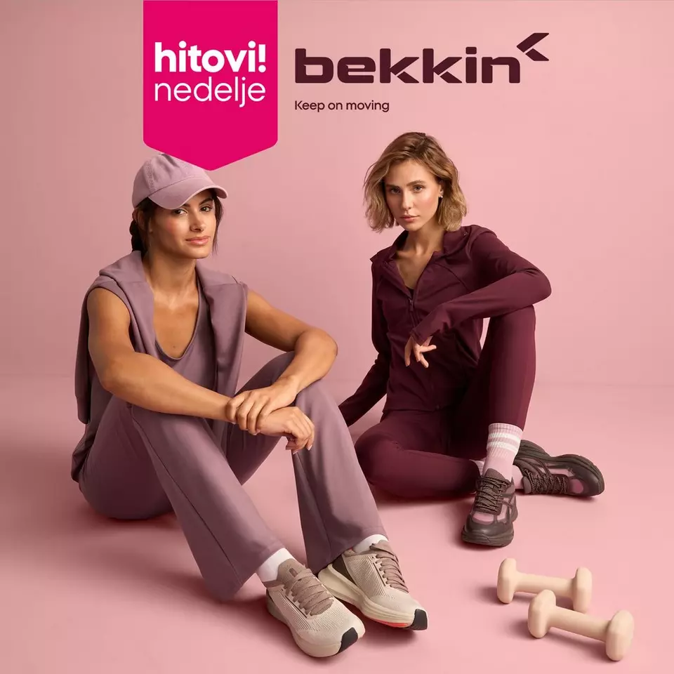 Dve žene u Pepco Bekkin sportskoj odeći sede opušteno sa tegovima u blizini.