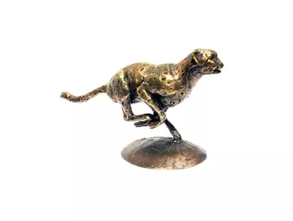 Pepco bronze-colored decorative figurine of a running dog mounted on a circular base.