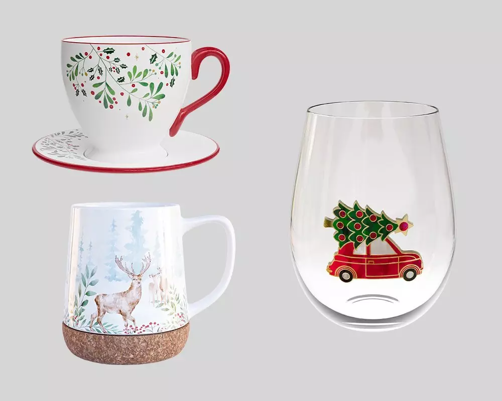 Pepco festive drinkware collection featuring a holly-decorated teacup, deer-themed mug, and wine glass with car carrying Christmas tree.