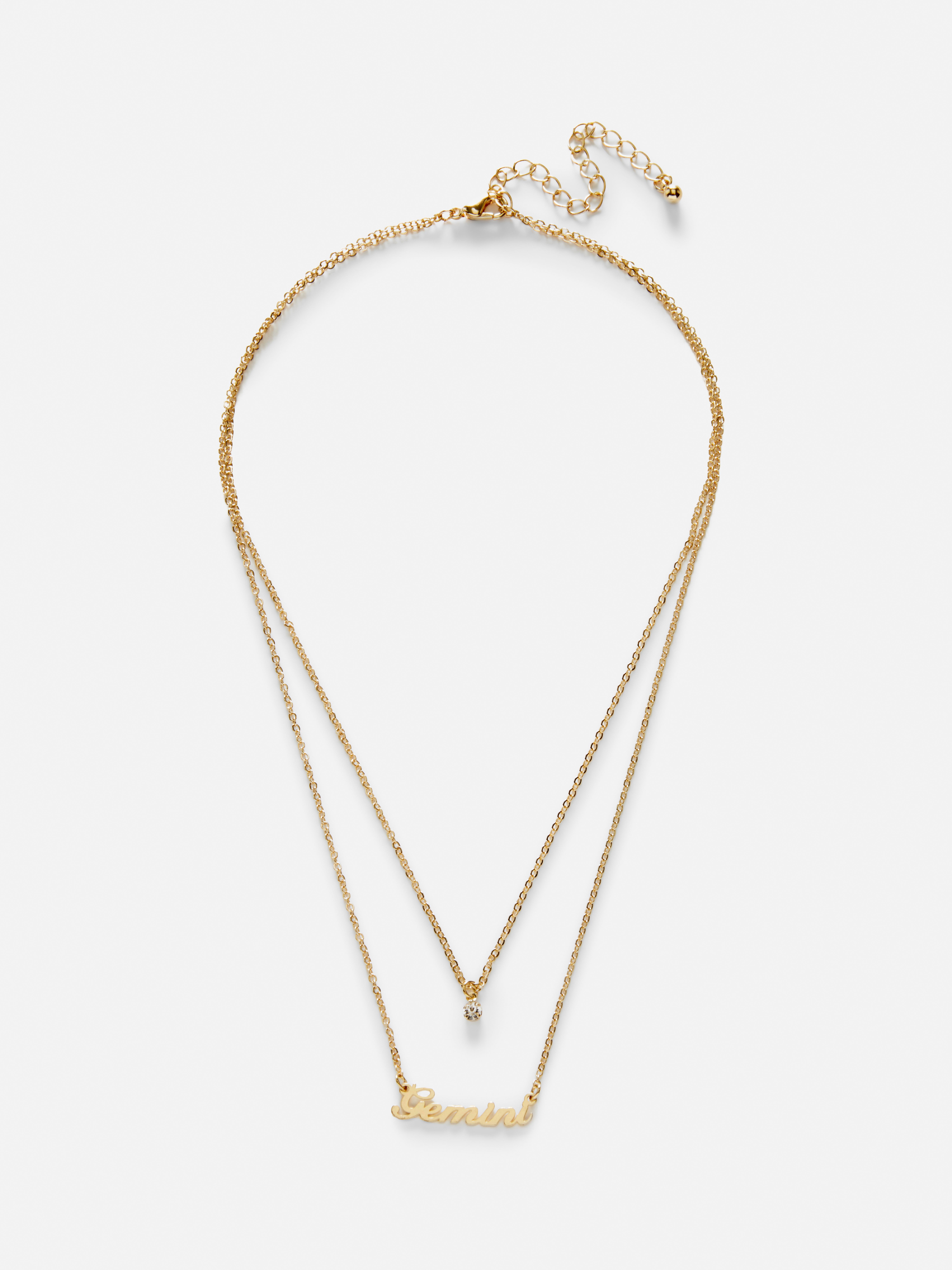 Layered Gold-Tone Star Sign Pendant Necklace Grey