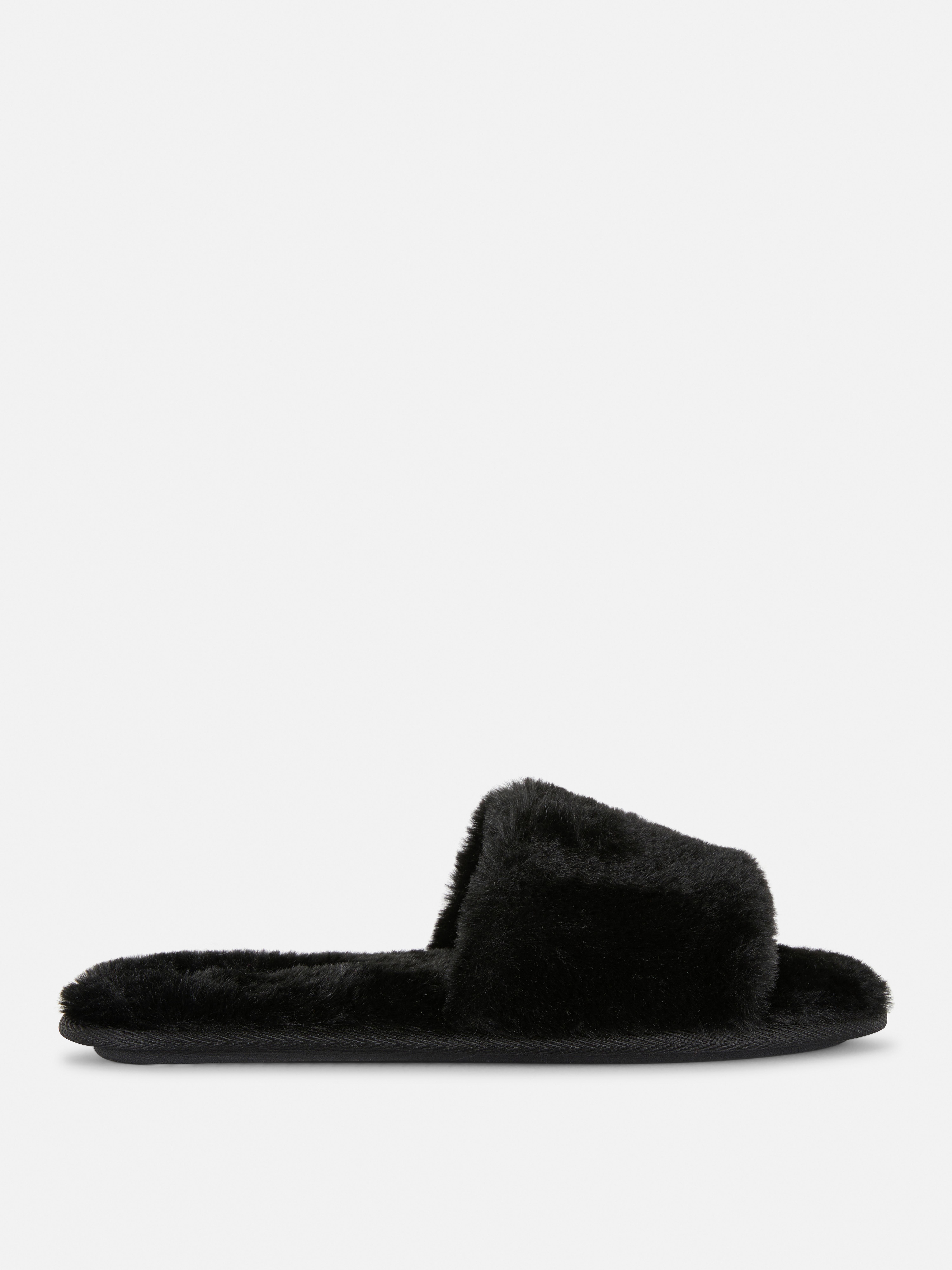black fur slip ons