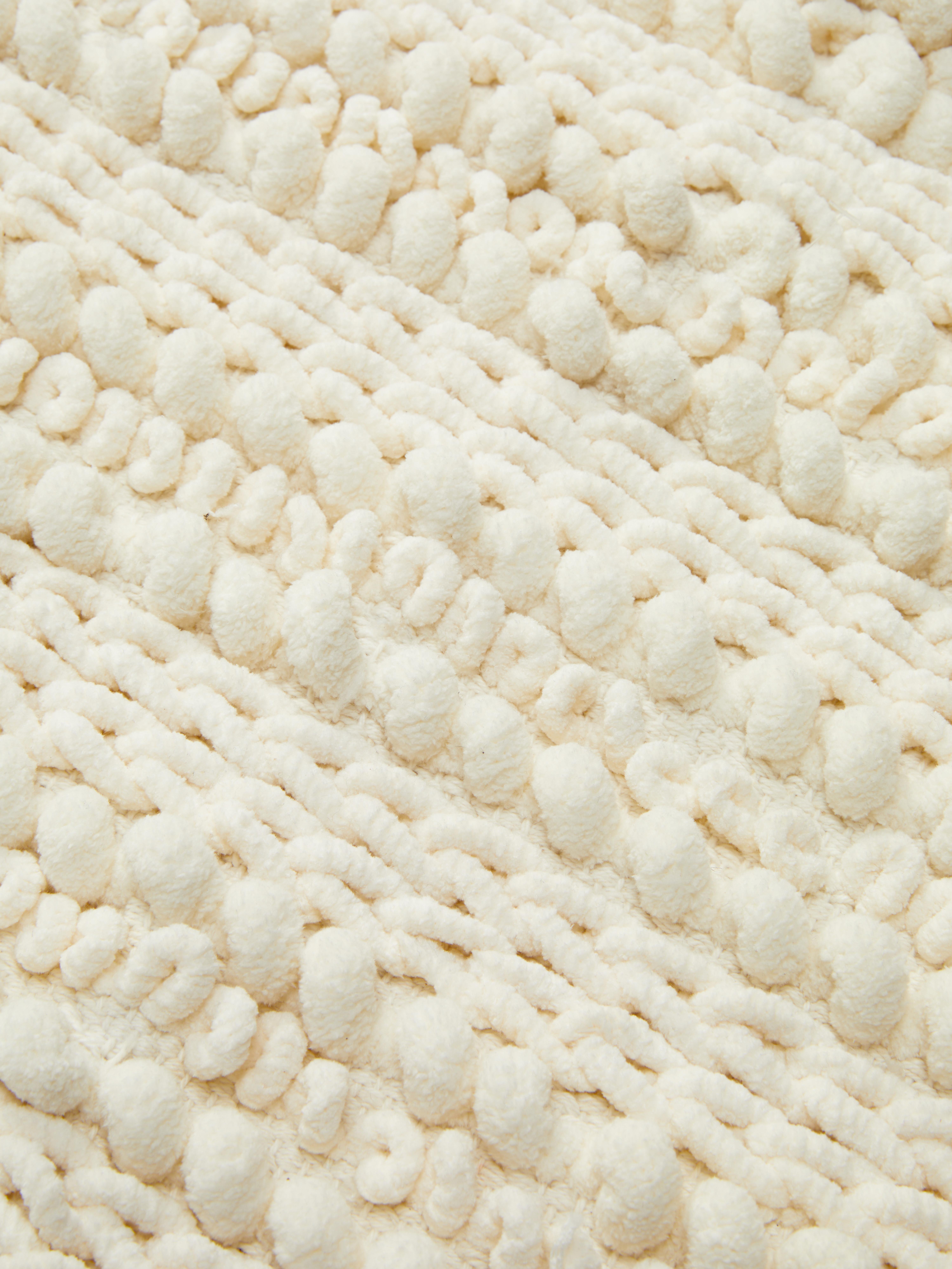 Knit Mat With Tassels