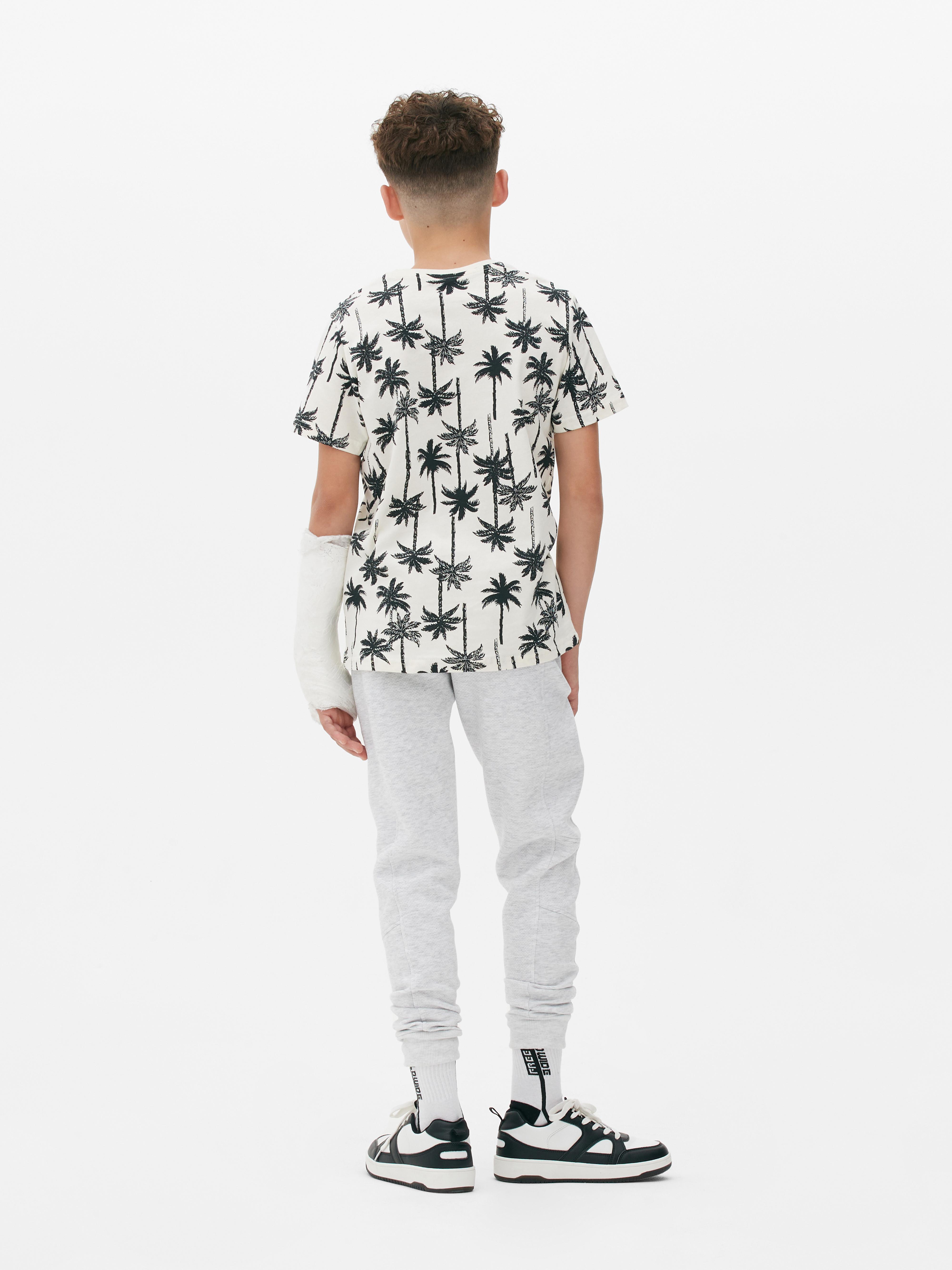 T-shirt z nadrukiem w palmy