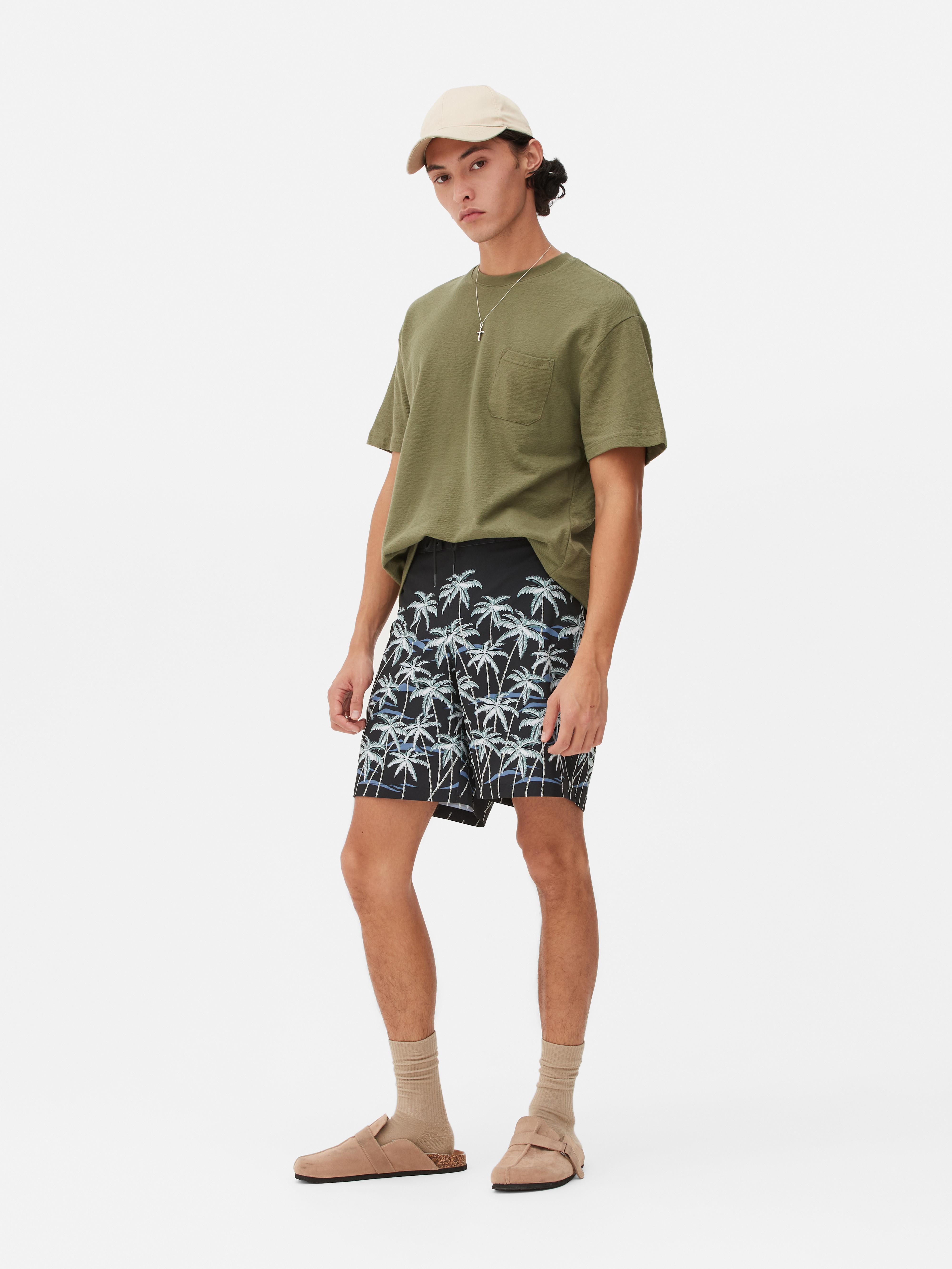 Boardshorts mit Palmen-Print Schwarz