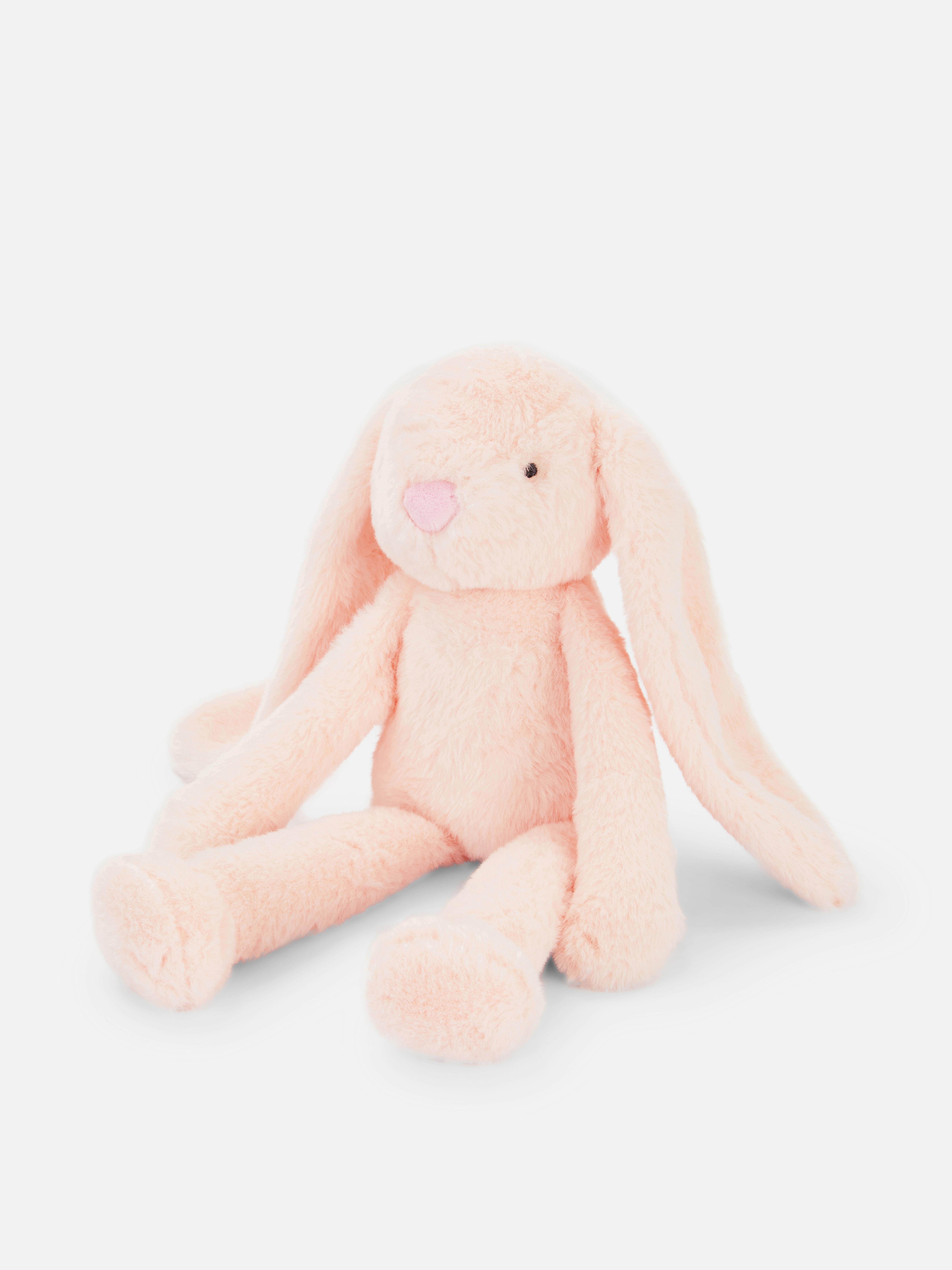 Peluche lapin assis