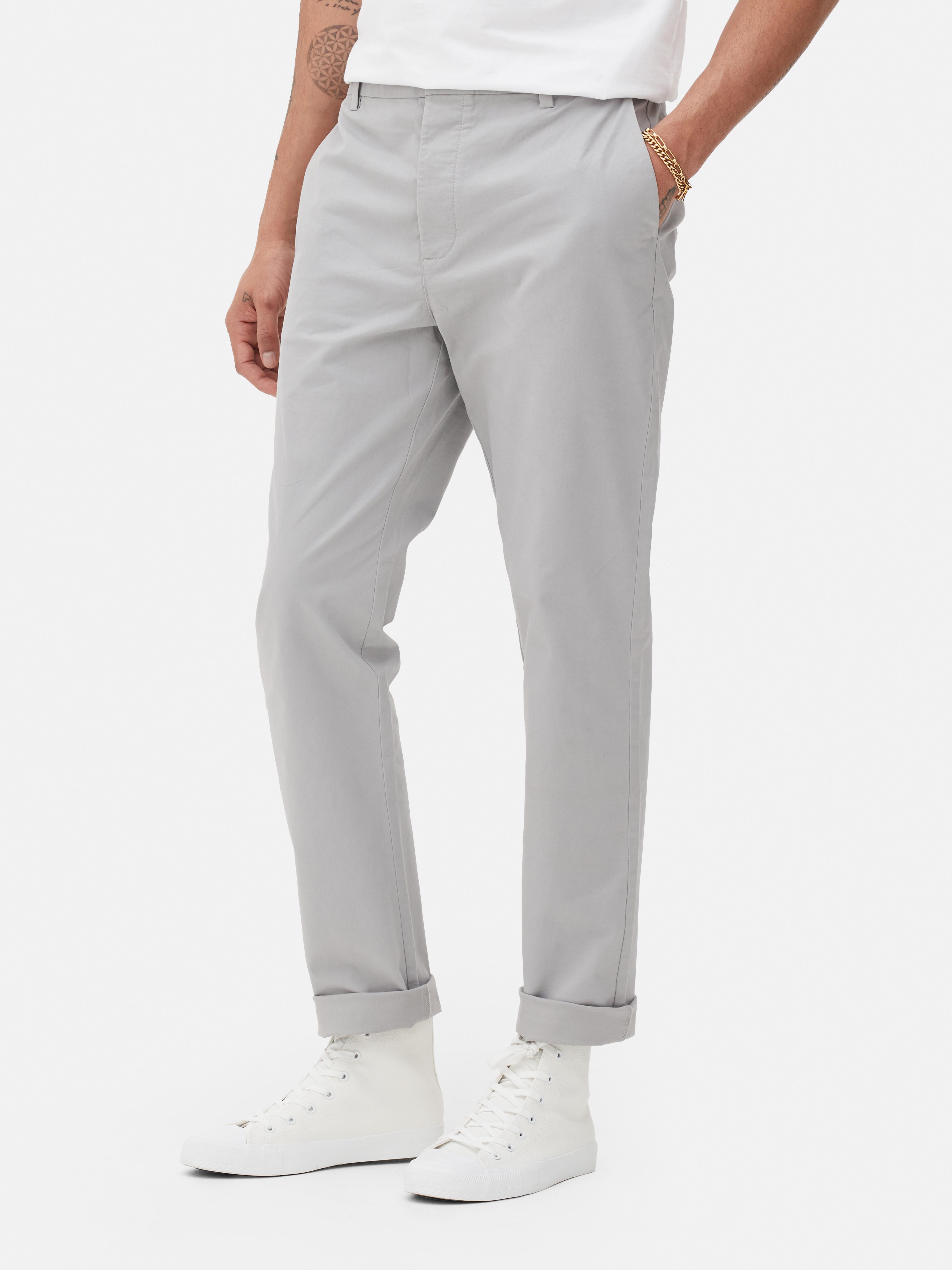 Pantalones chinos de corte entallado elasticos Gris claro Hombre Primark