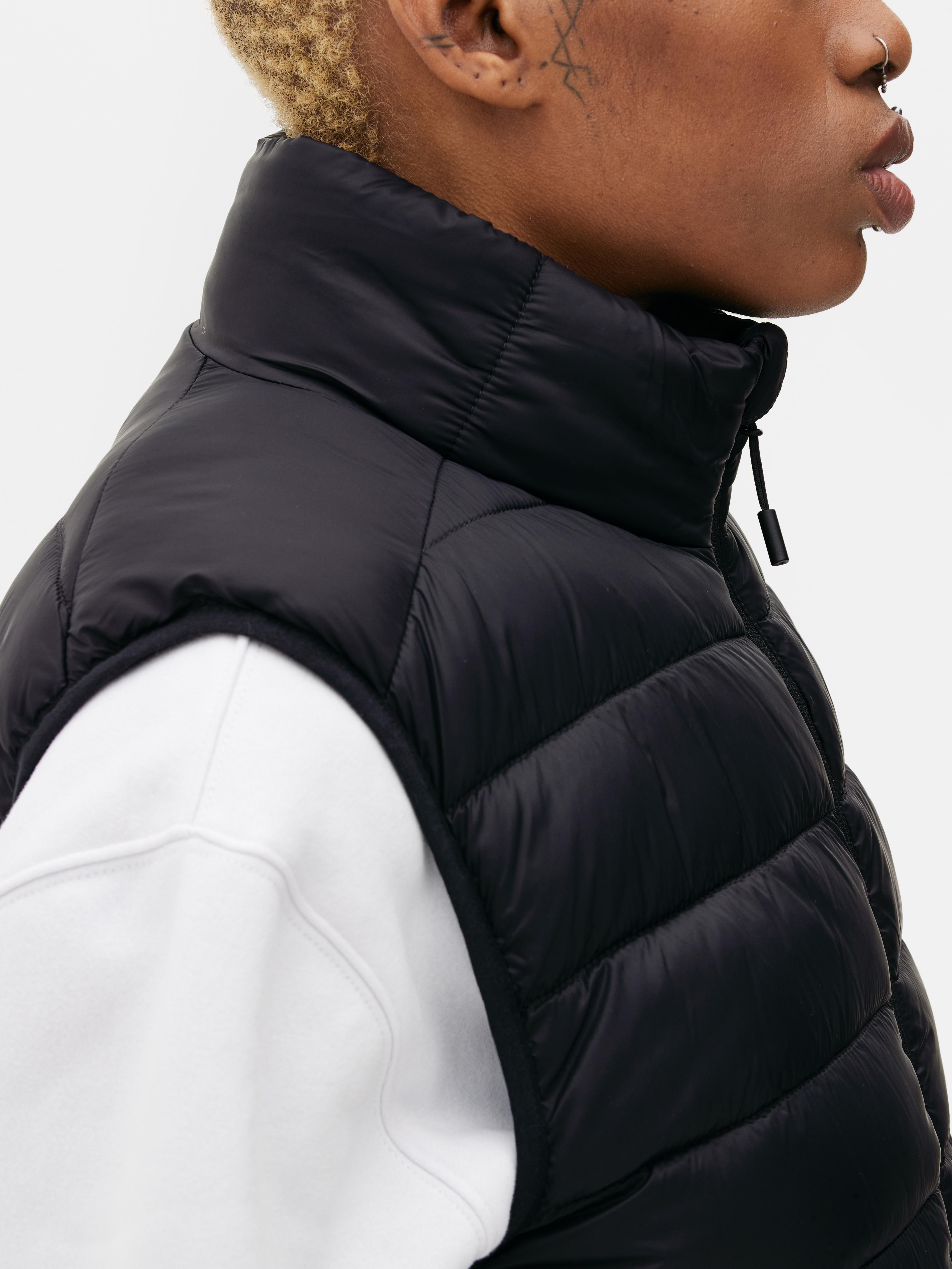 Black puffer outlet vests