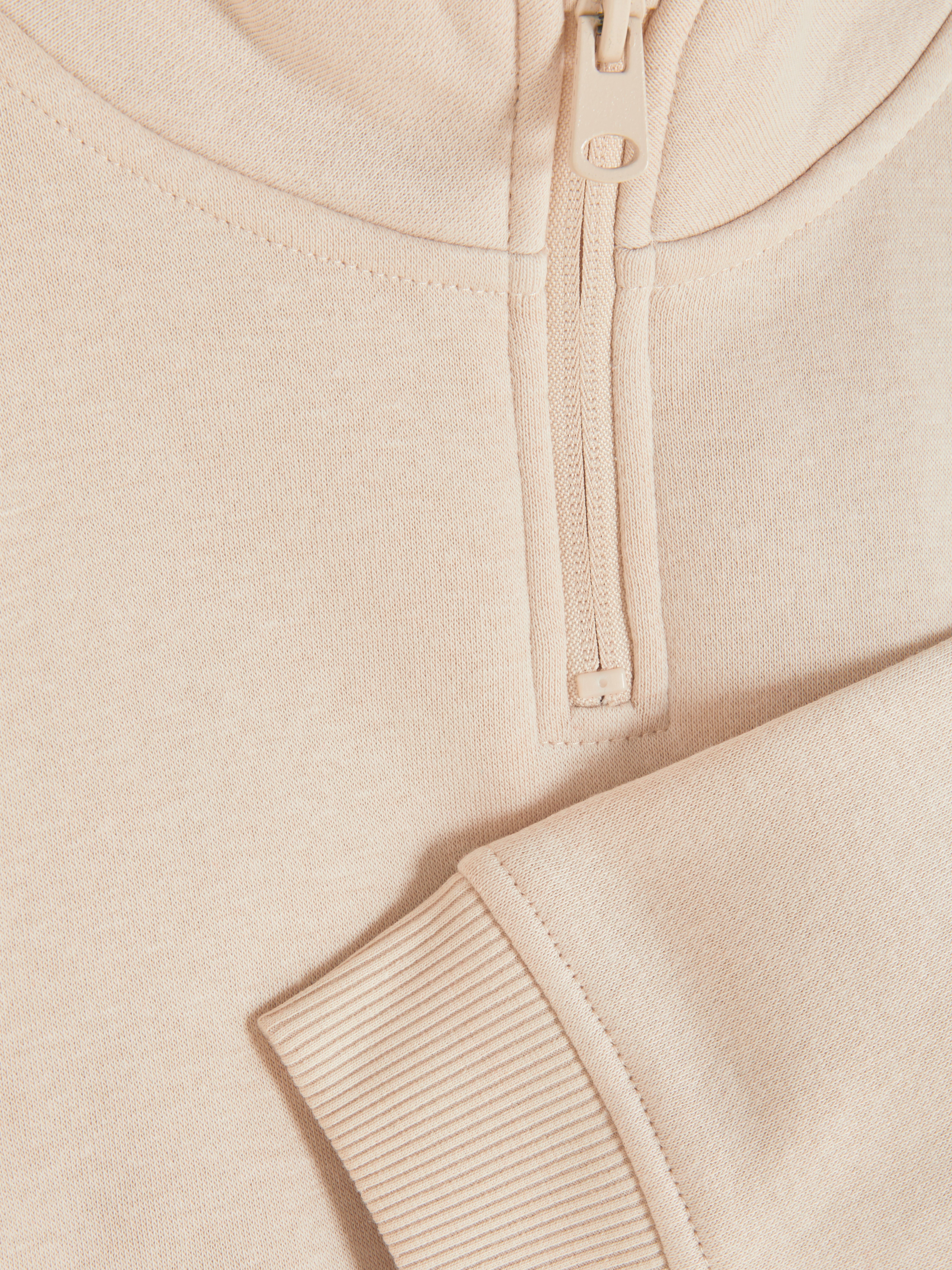 Bluza ze stójką zapinaną na suwak z przodu