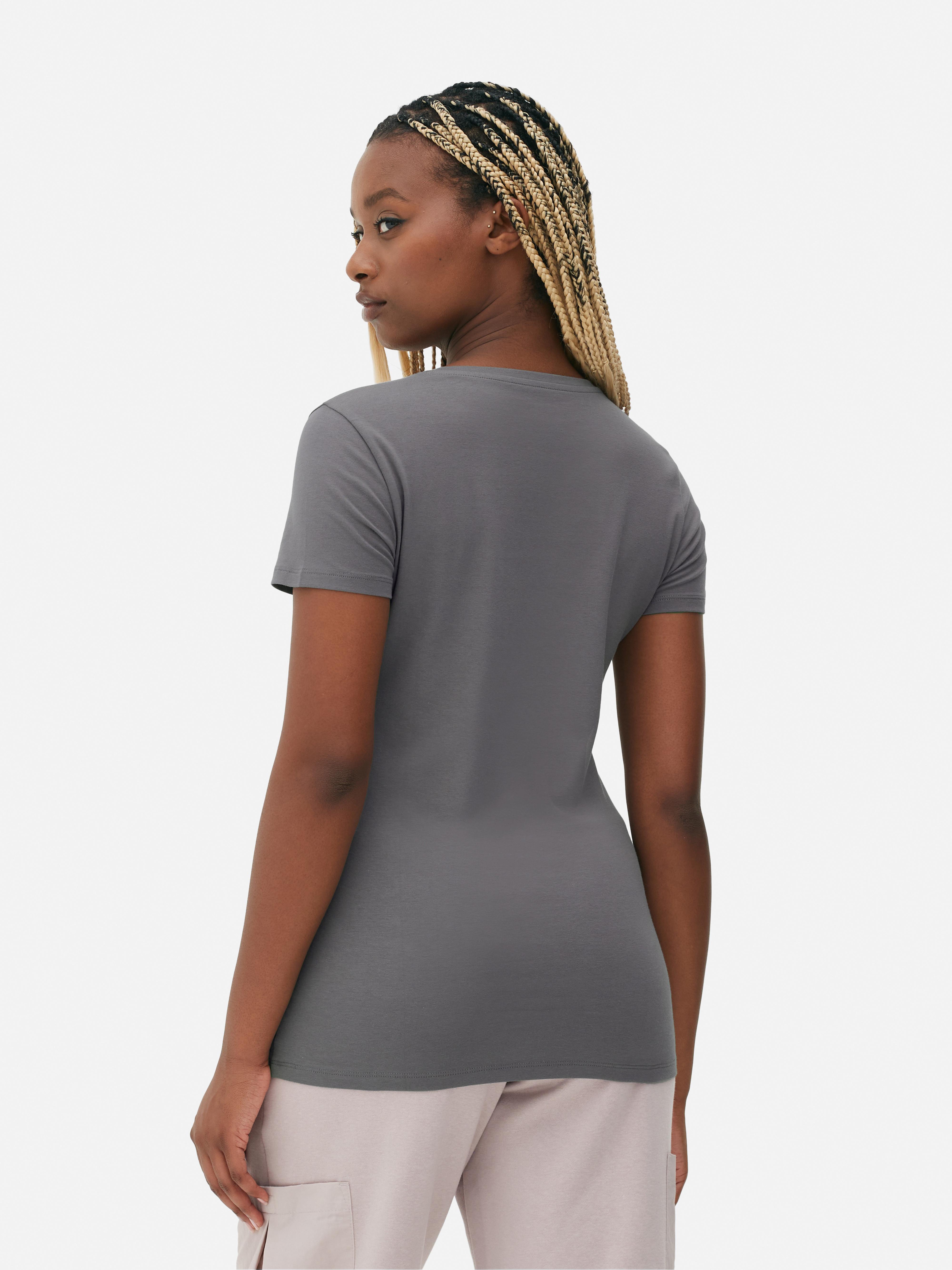 Camiseta elástica de manga corta y cuello redondo