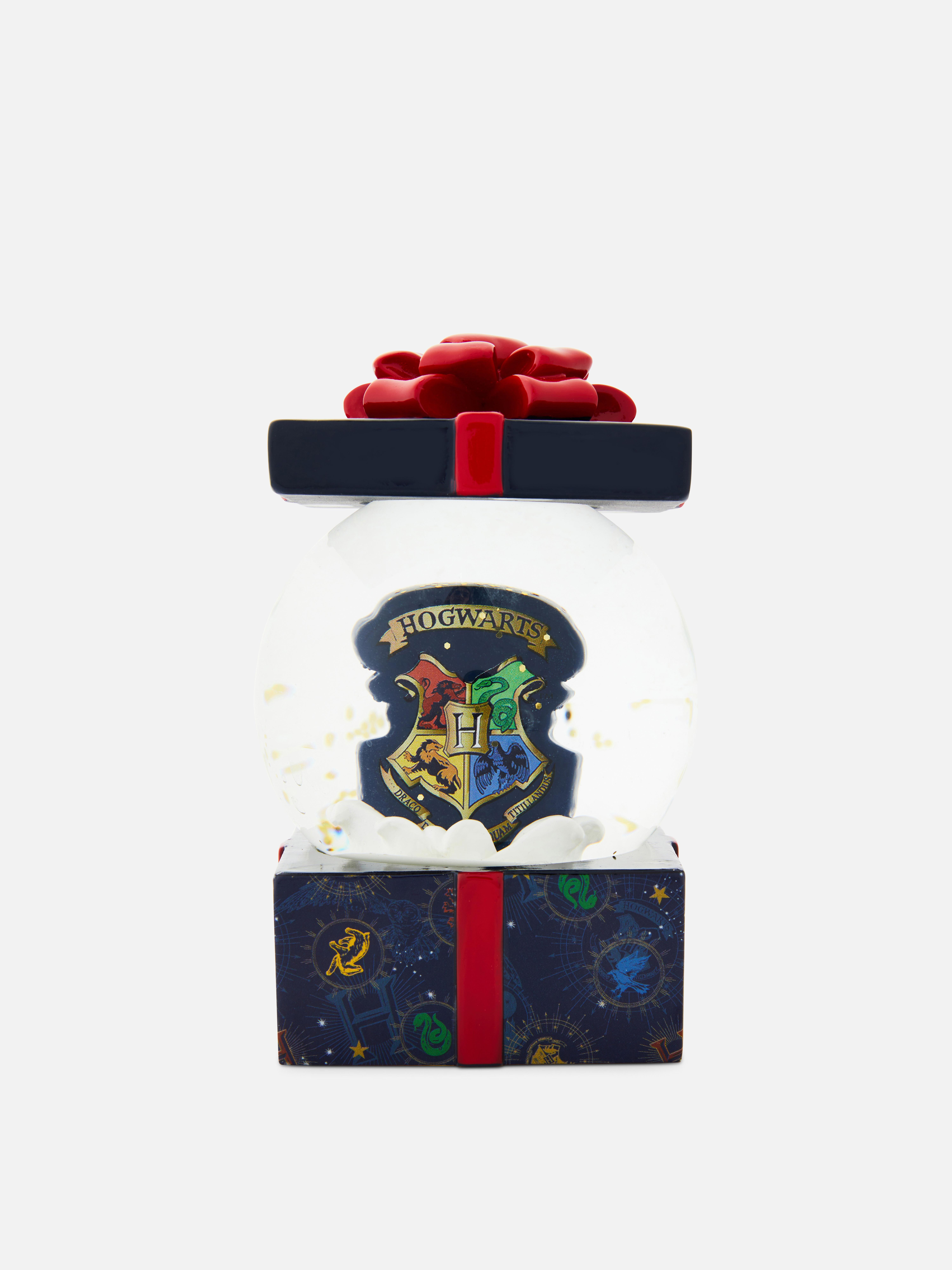 „Harry Potter™ Hogwarts“ Schneekugel mit Wappen