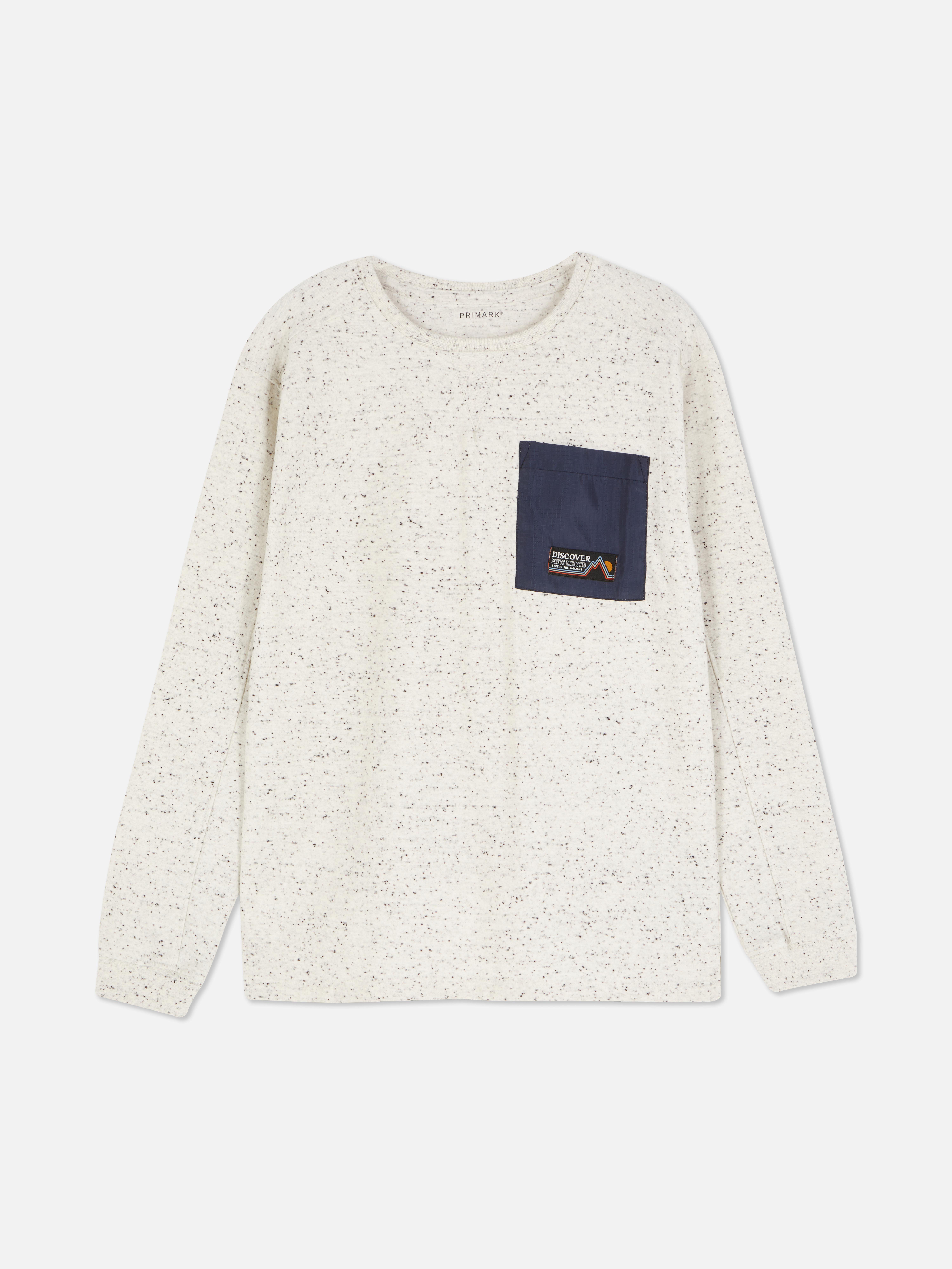 T-shirt maculata con taschino a contrasto