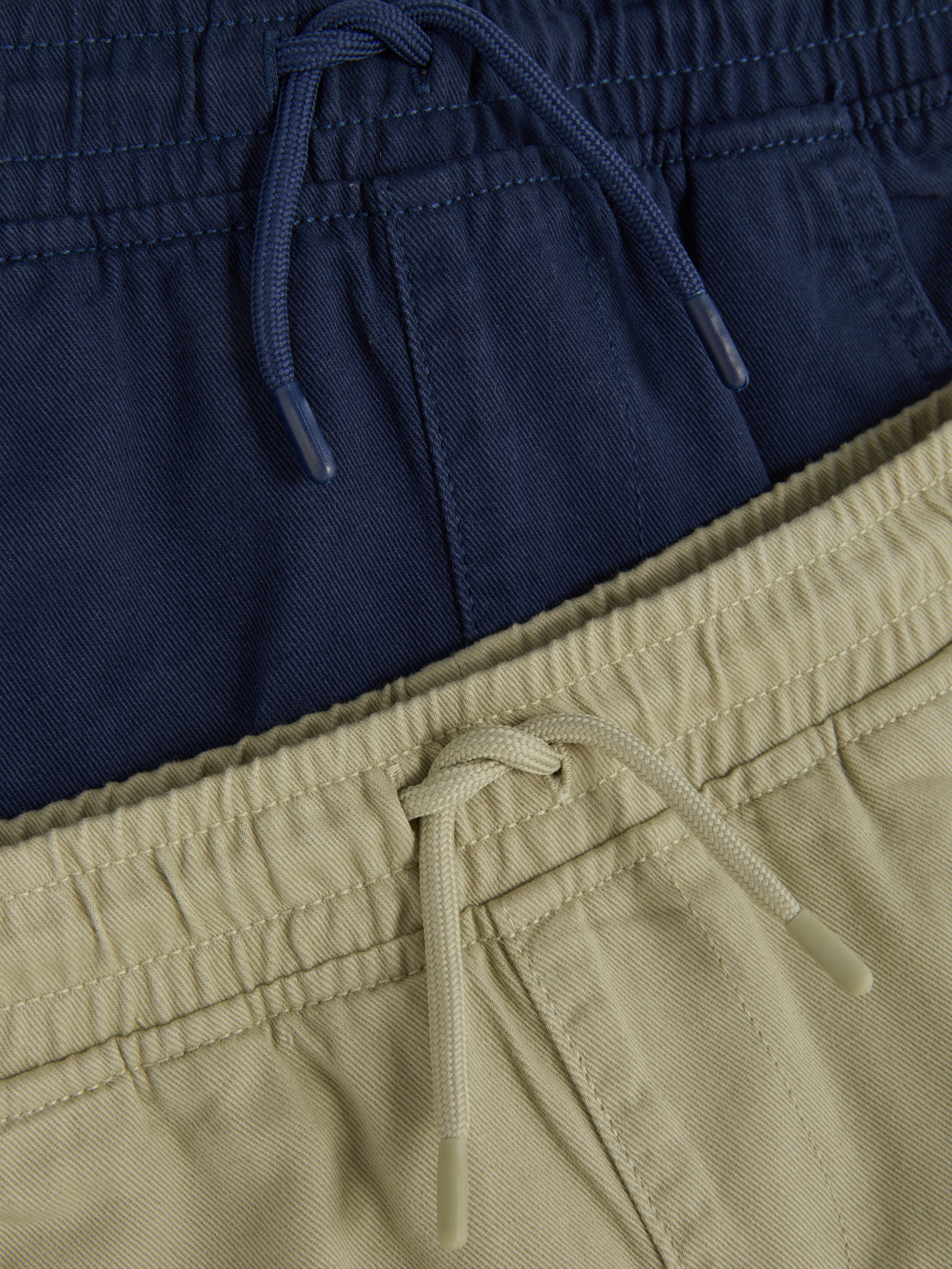 2 perechi de pantaloni chino din serj