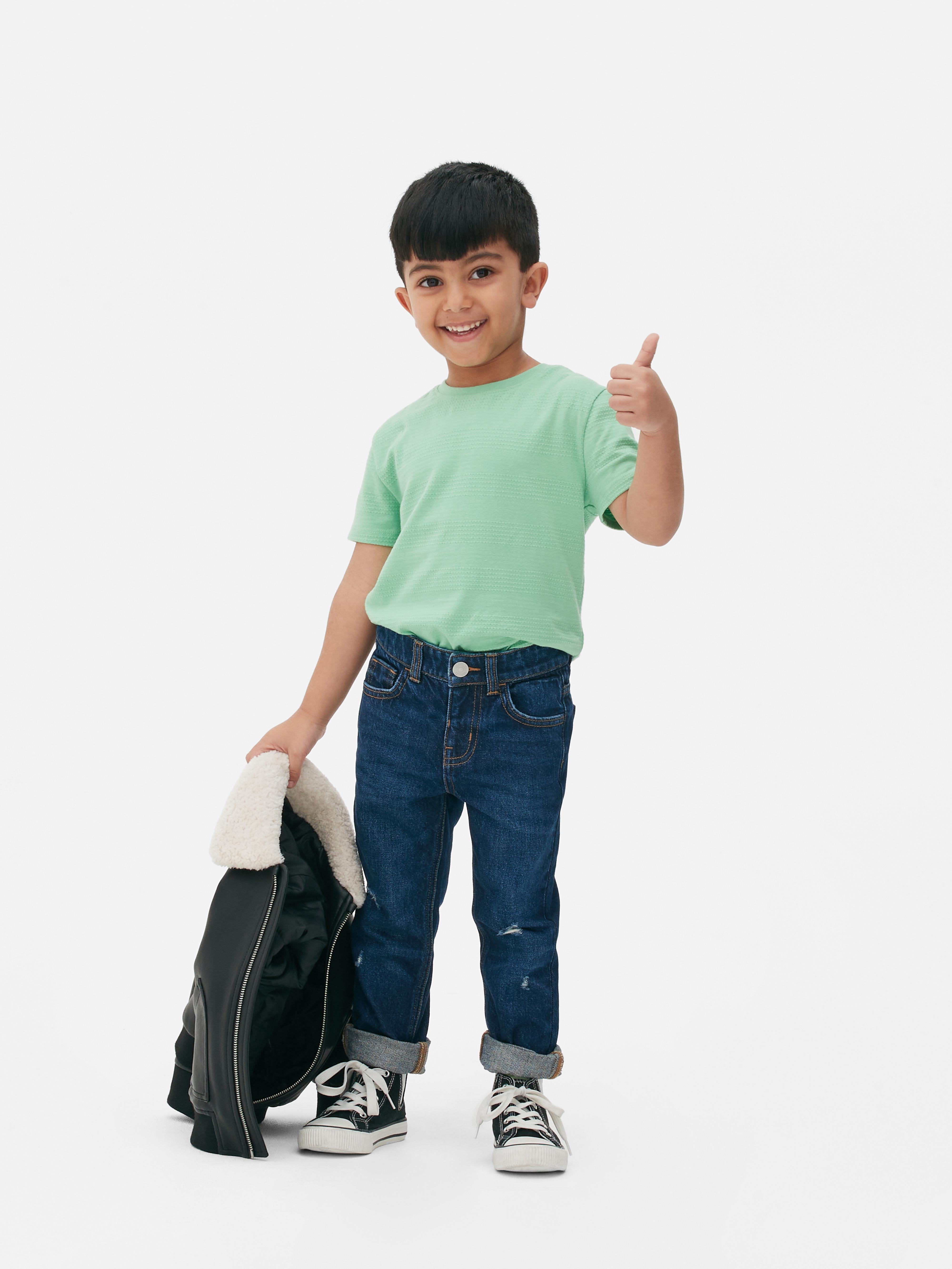 Niños Pantalones De Chándal Remendados Con Parches Foto de archivo - Imagen  de manera, puntadas: 214982864