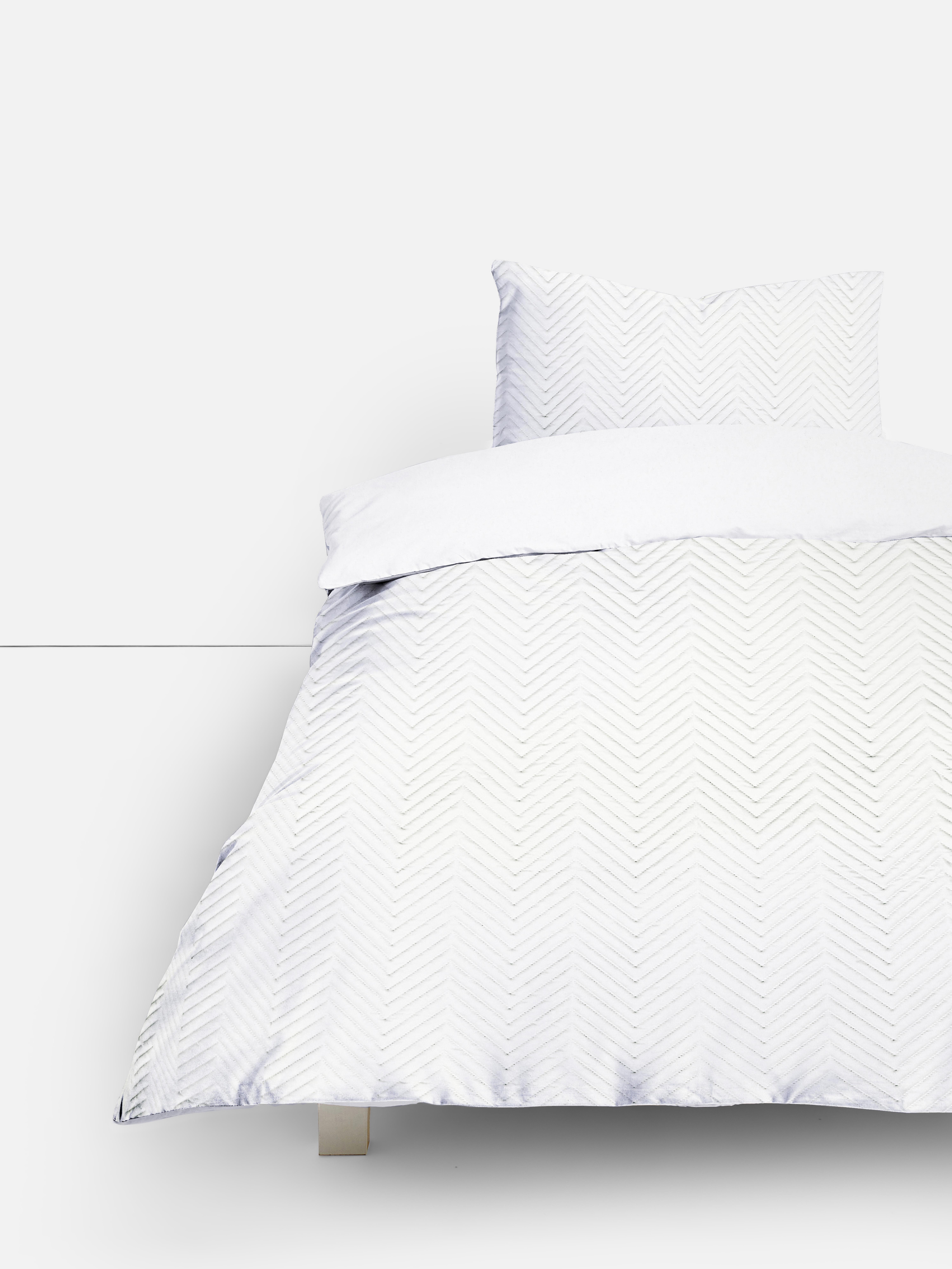 Obojestranski teksturiran komplet posteljnine za enojno posteljo