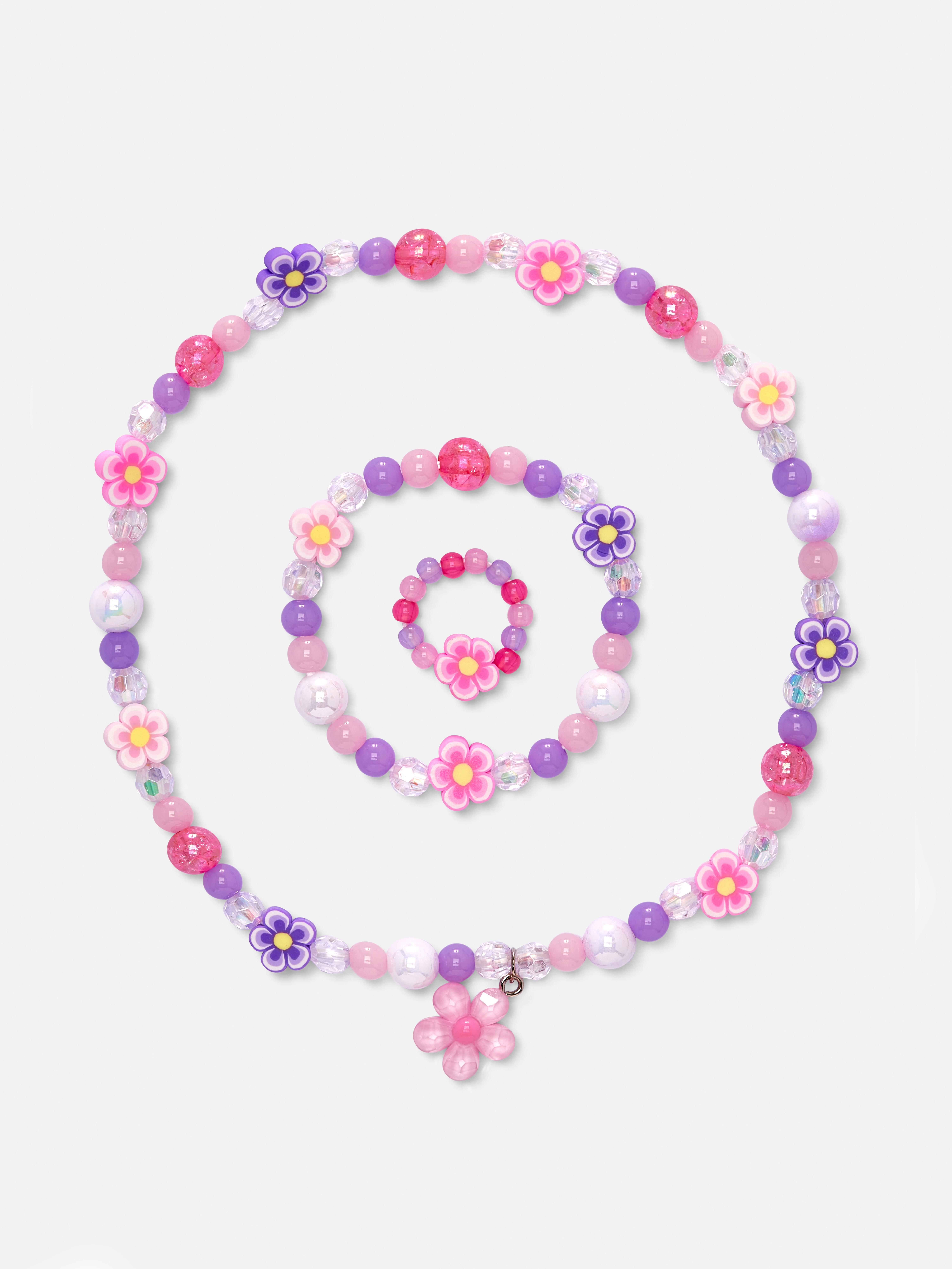 Dreiteiliges Schmuckset mit Blumen und Perlen
