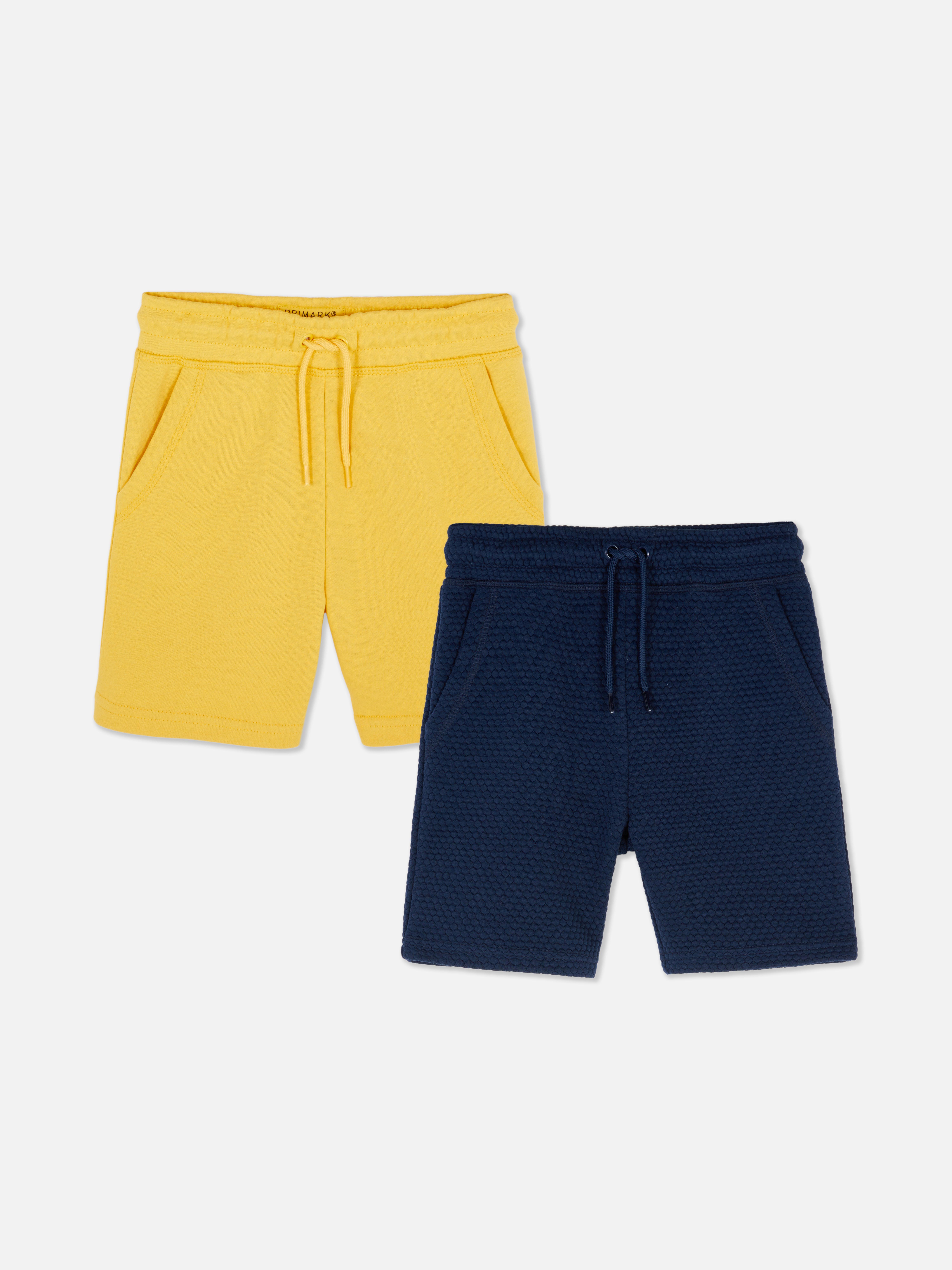 Pantalón corto para Niño en color amarillo con cinturón azul marino