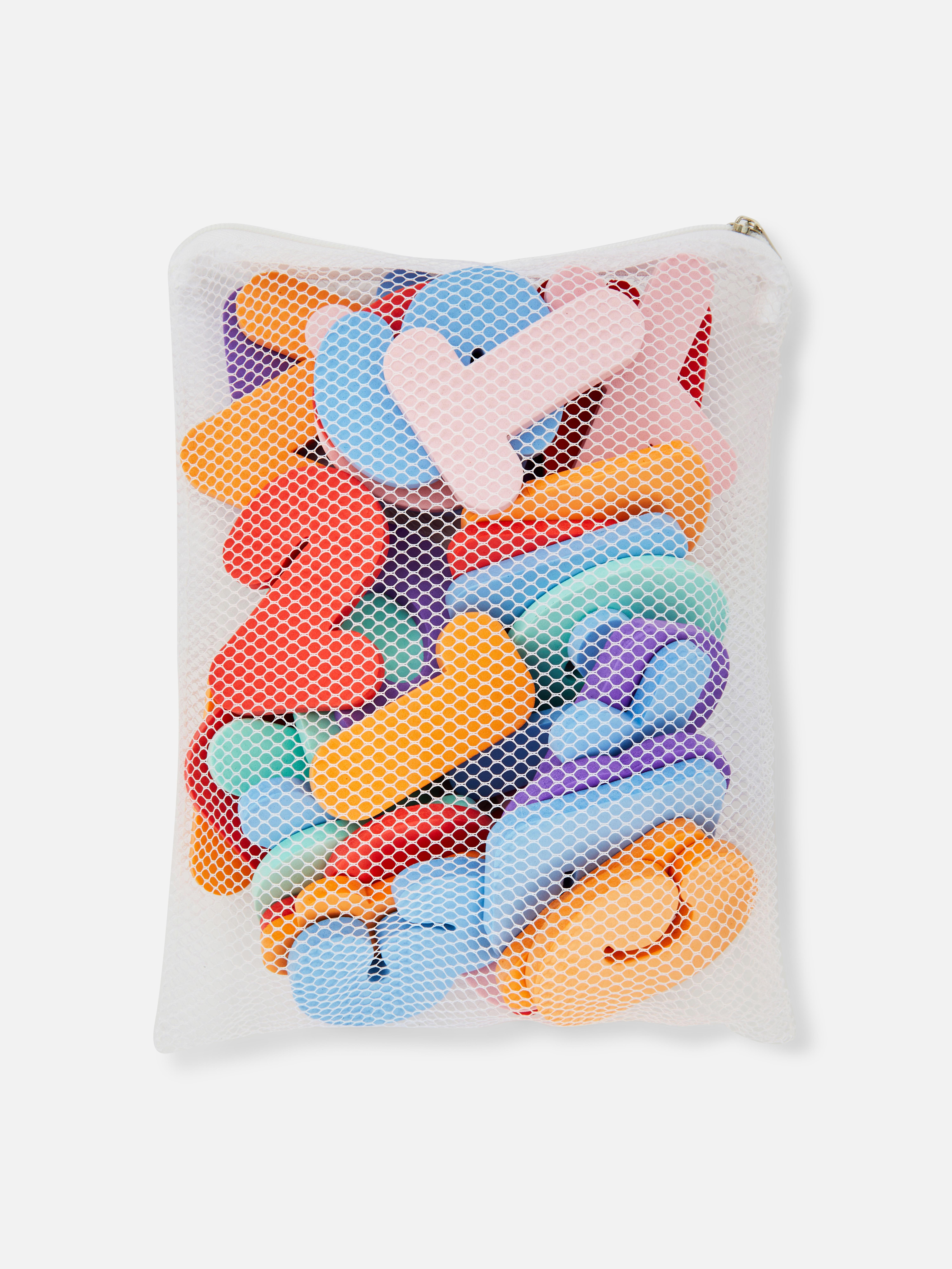 Schaumstoff-Badespielzeug mit Buchstaben und Zahlen