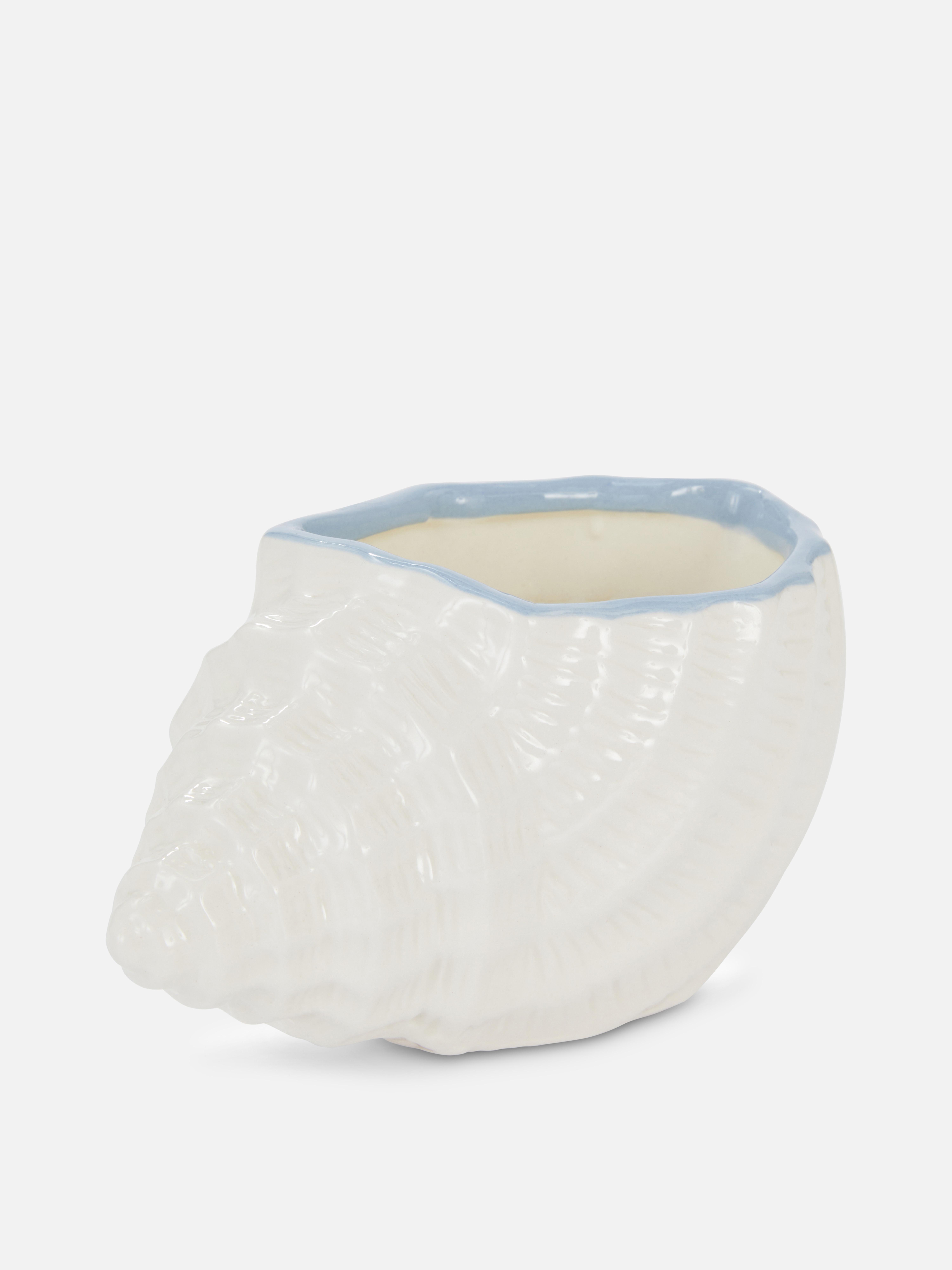 Ceramiczna świeca w kształcie morskiej muszli