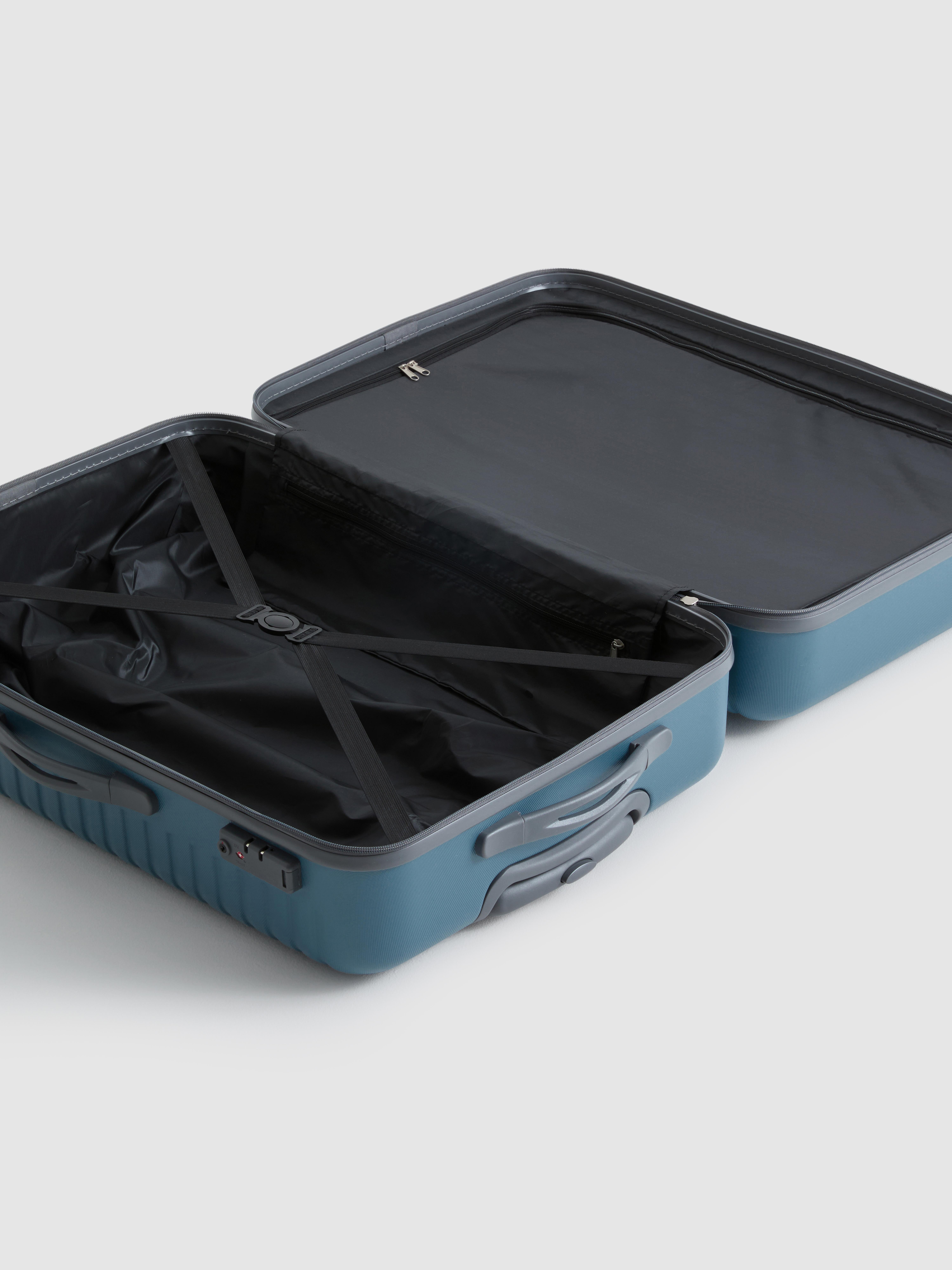 Mala viagem rígida quatro rodas canelada