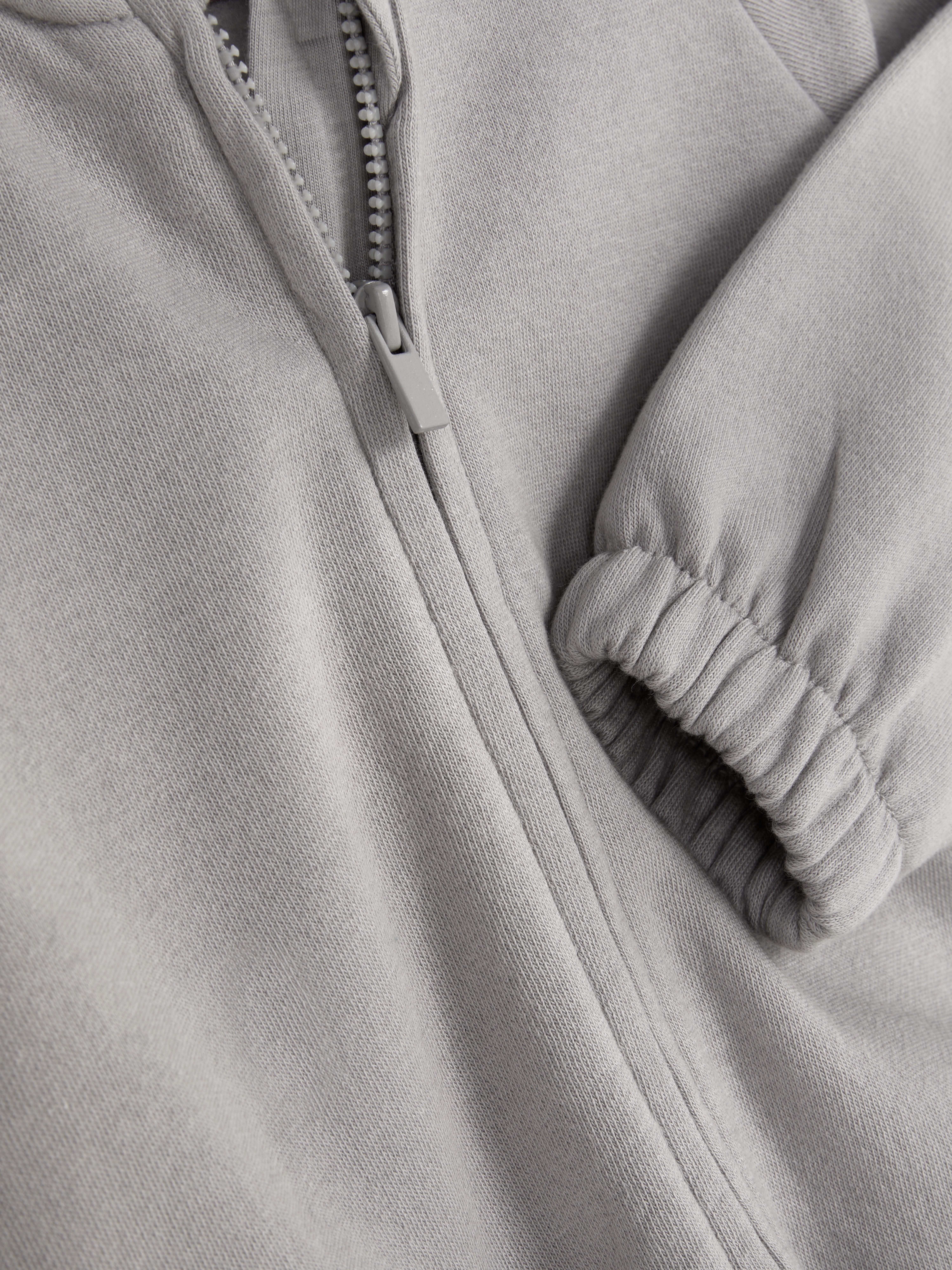 Sudadera con capucha y cremallera
