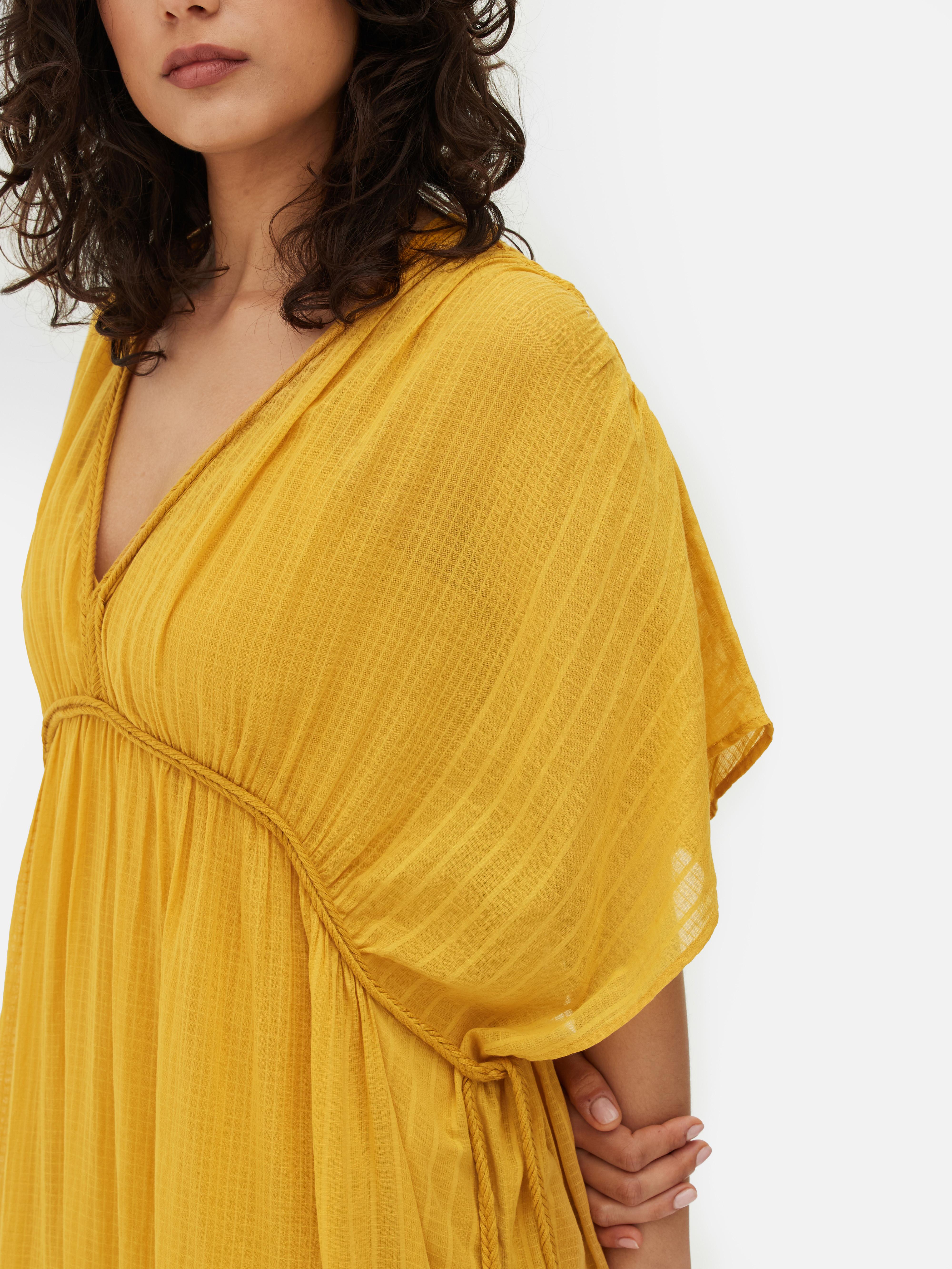 Midi-kaftan met verlaagde mouwinzet en vlechtdetails