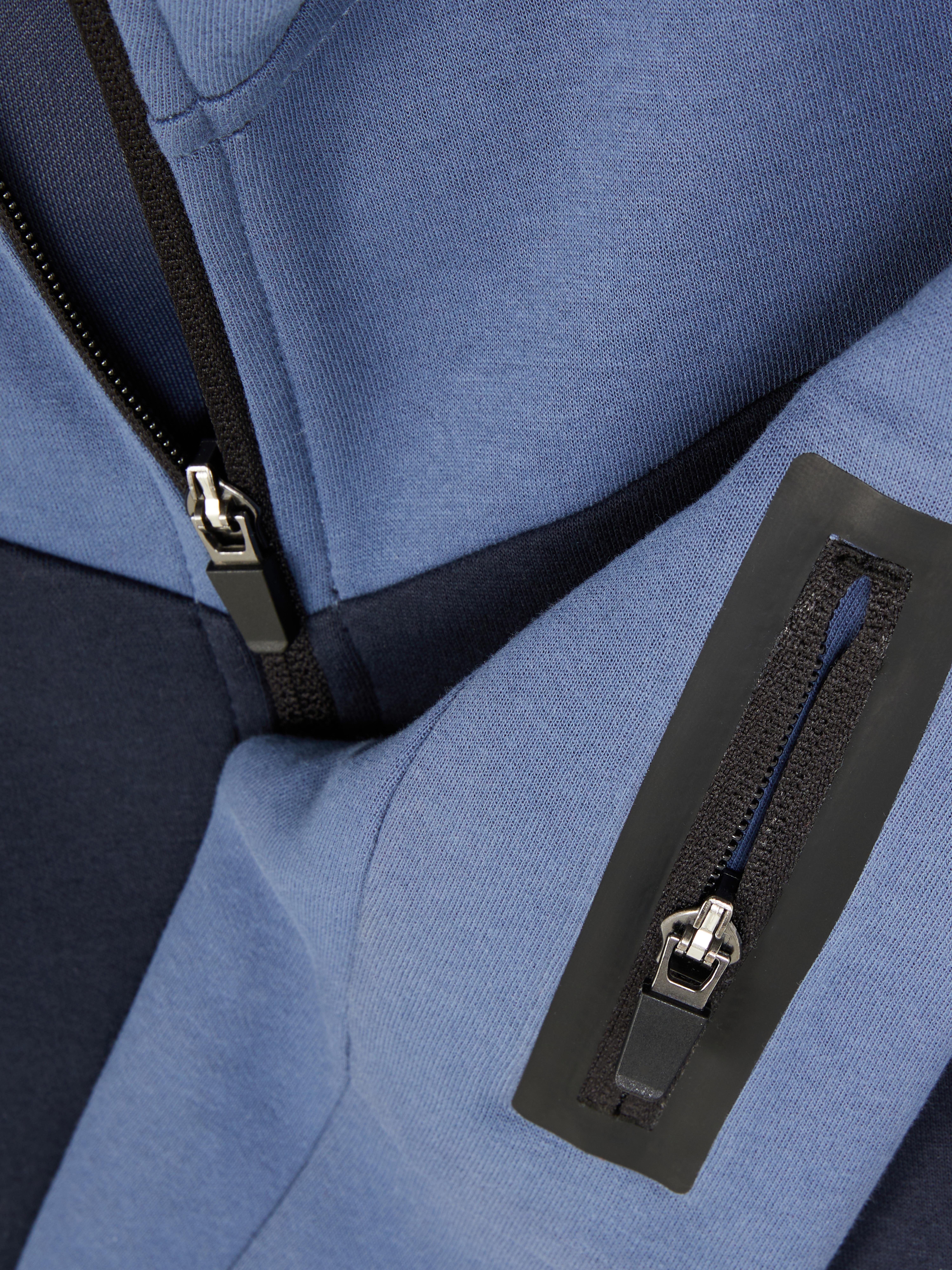 Felpa con cappuccio doppiato e zip coordinata