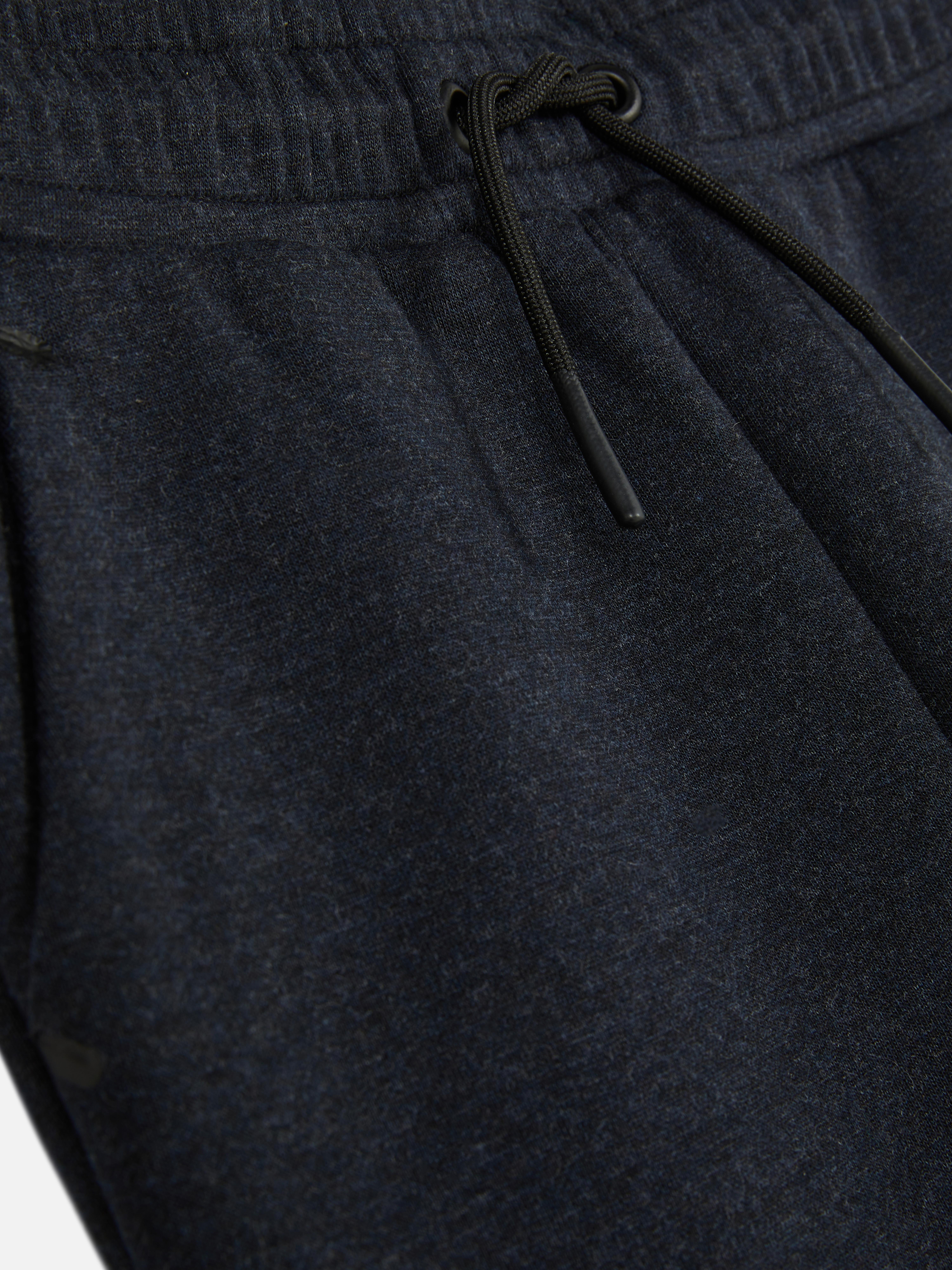 Joggers reforzados con bajos ajustados