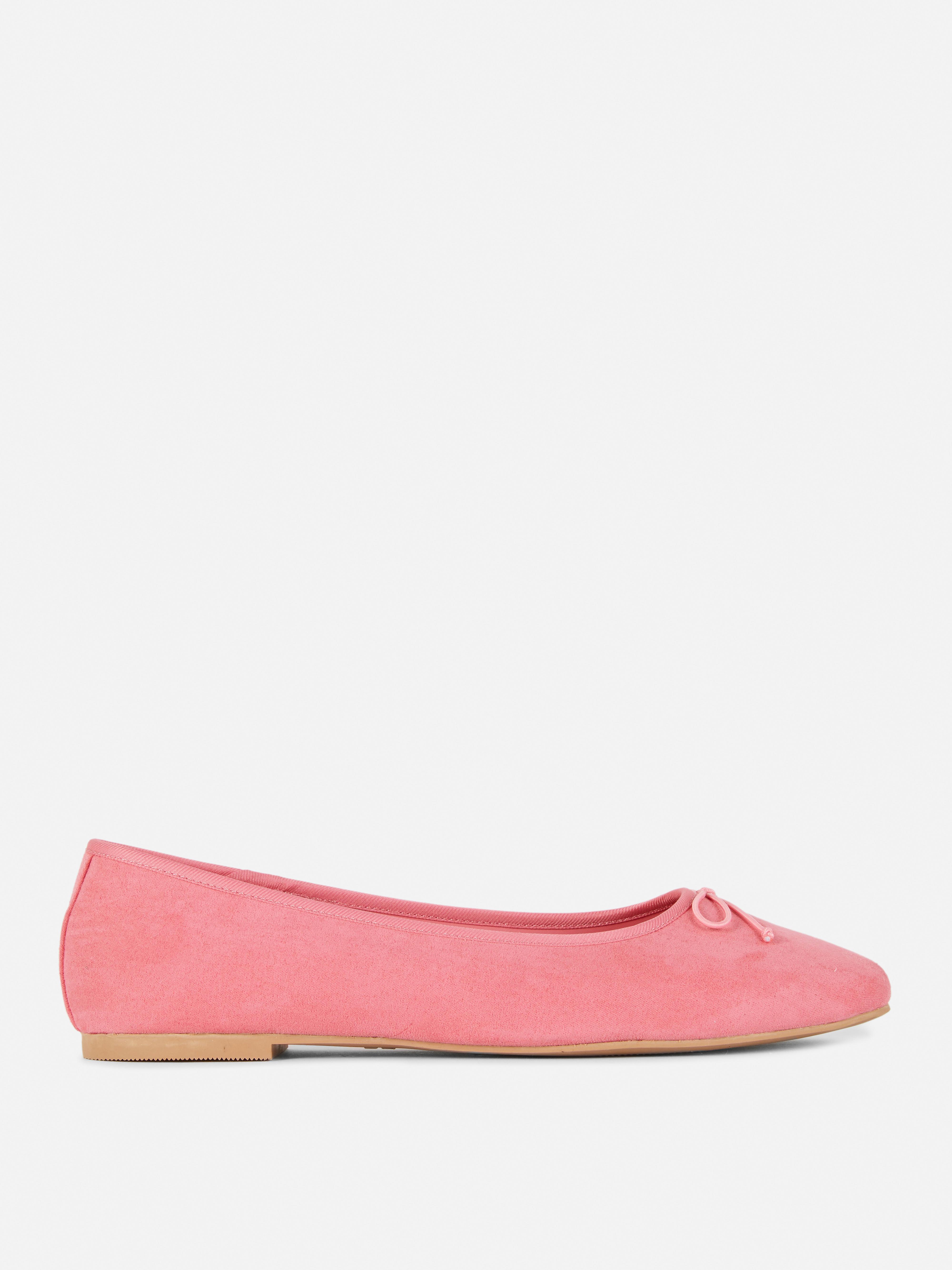 Ballerina's van suèdine met strikje en wijd model