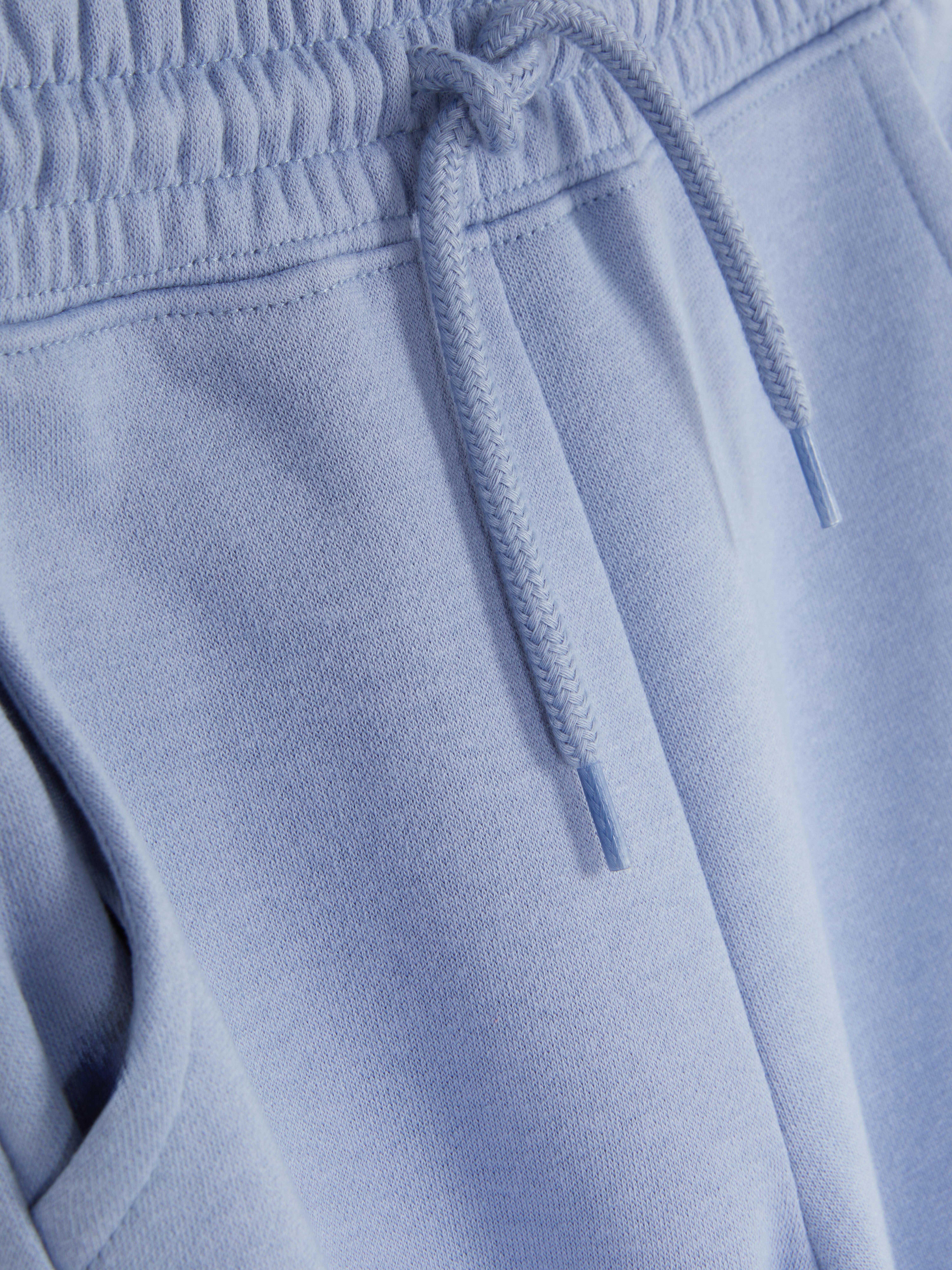 Pantalones de chándal con cordón de ajuste