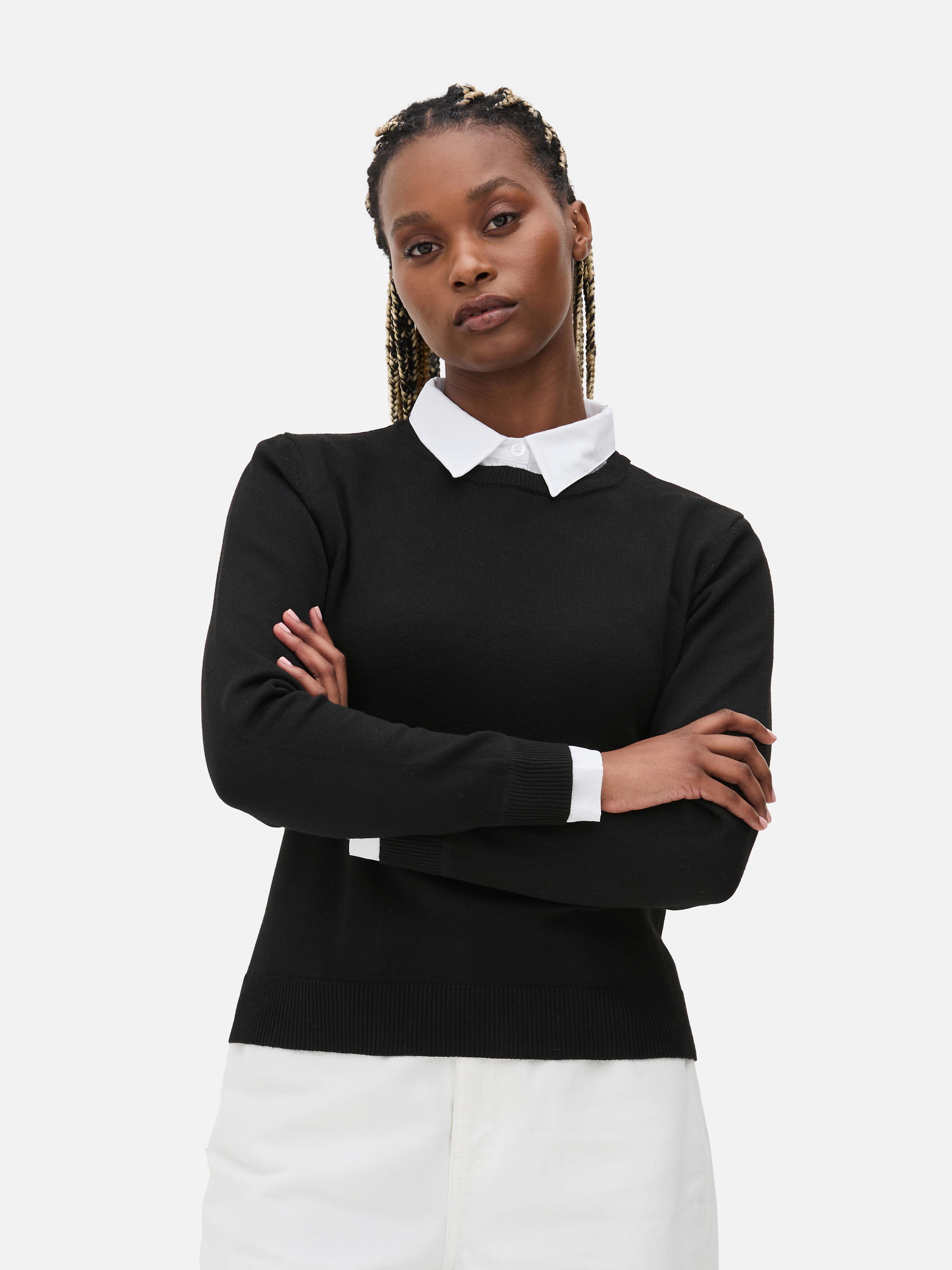 White shirt under black sweater women's sale